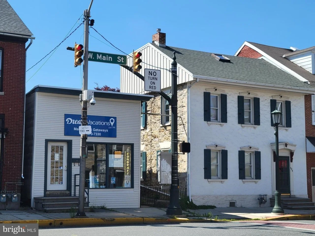 A House &amp; Commercial Building - $240,000