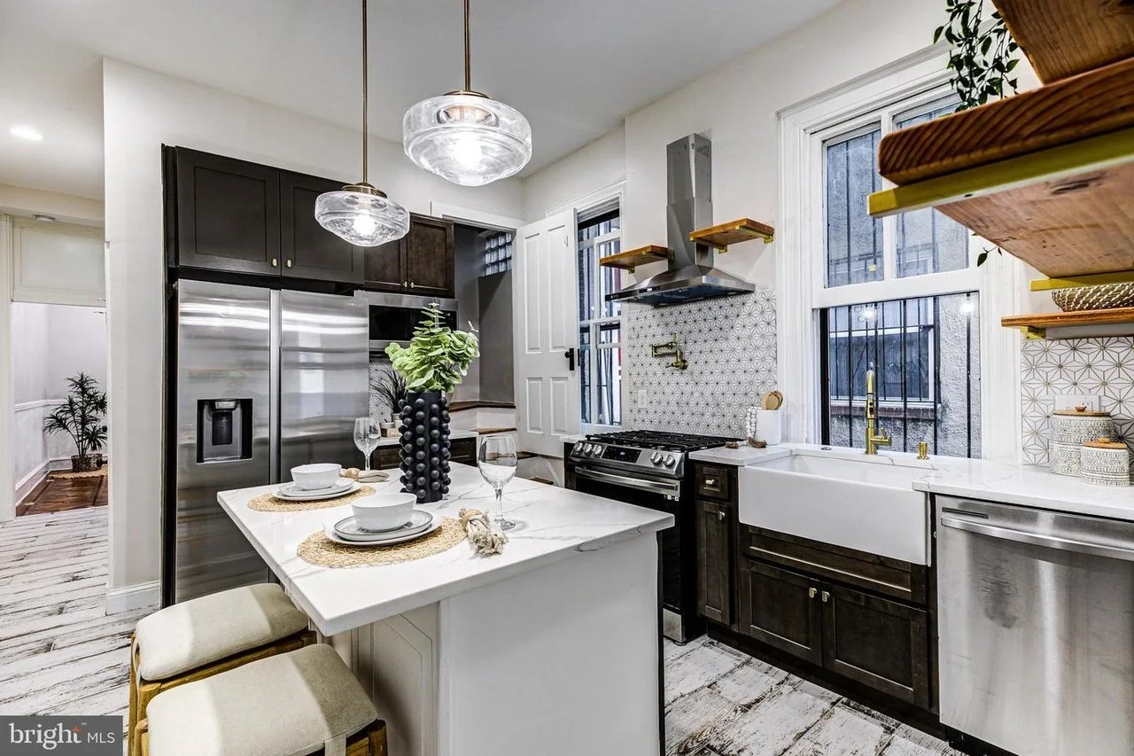 A Rowhouse with a Basement Apartment - $565,000