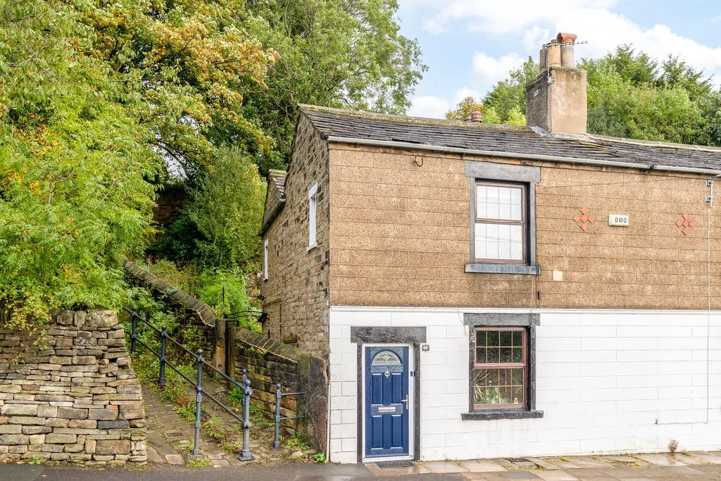 A 200 Year Old Home With a Tiered Patio Garden