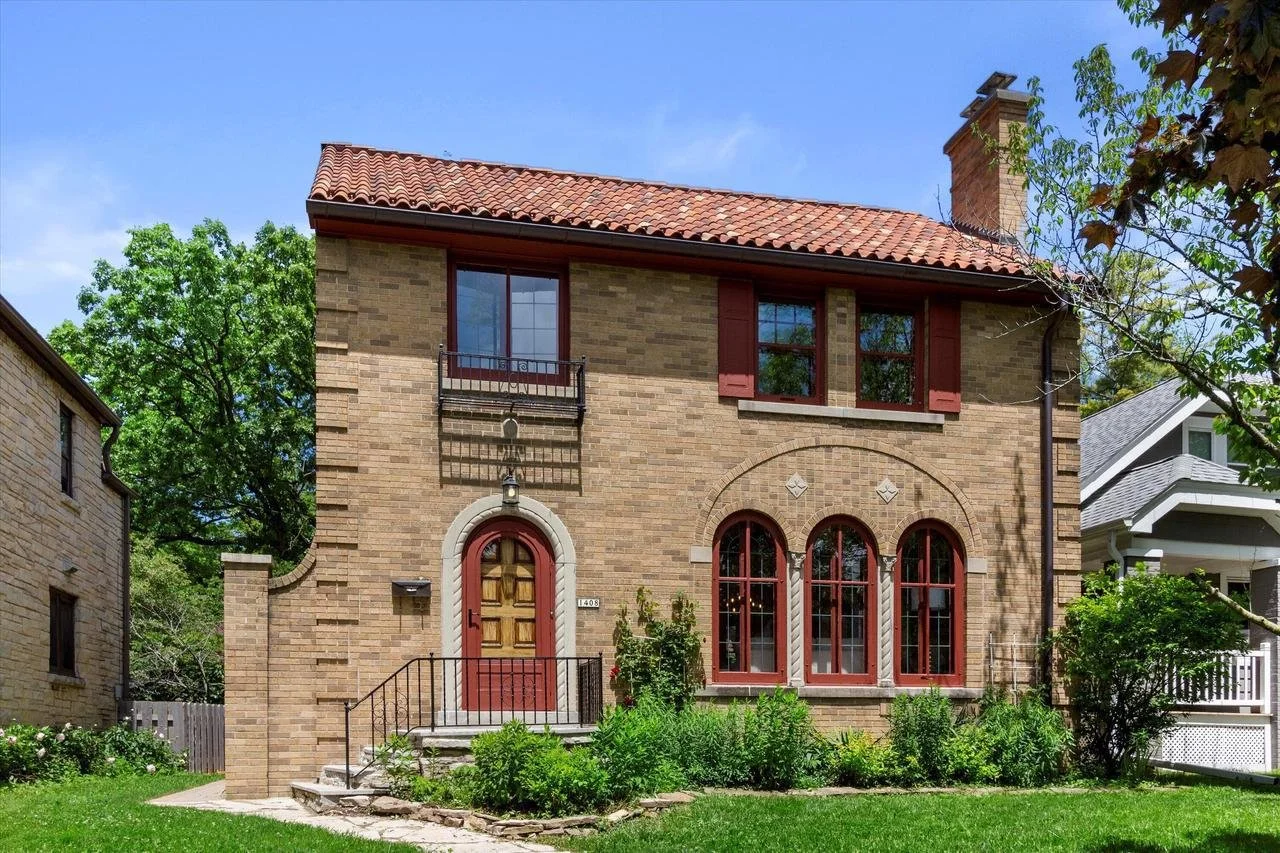 A Mediterranean Revival Brick Colonial - $489,900