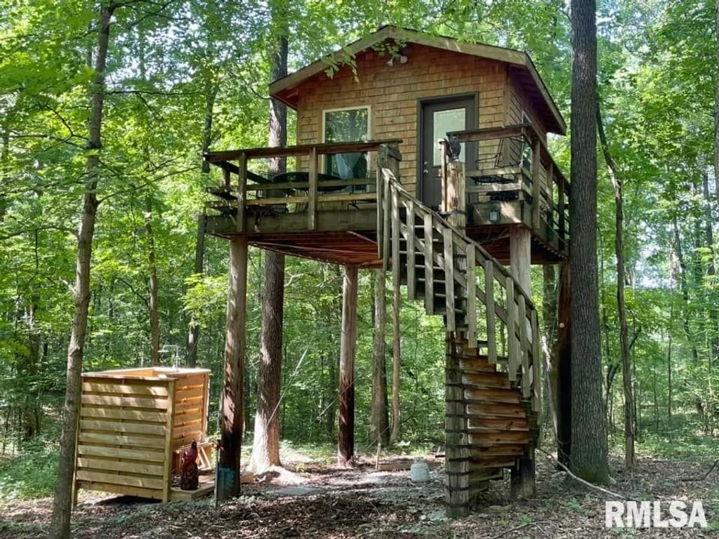 A Treehouse on Over 29 Acres - $164,900