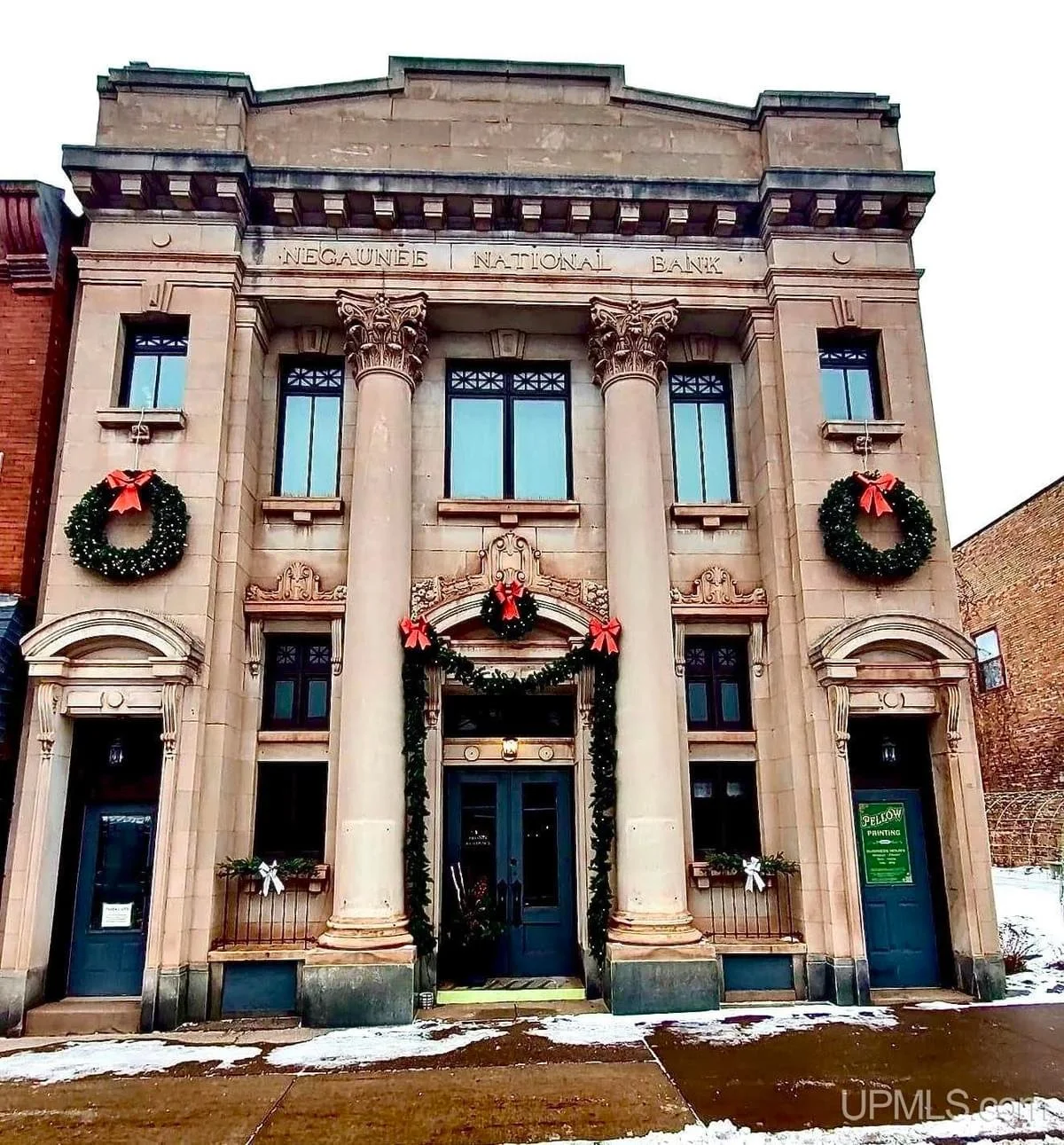 The 1913 National Bank Building in Negauee, MI - $499,900
