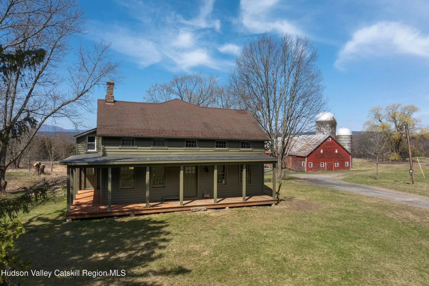 A 1900 Eyebrow Colonial Farmhouse on Over 5 Acres - $865,000