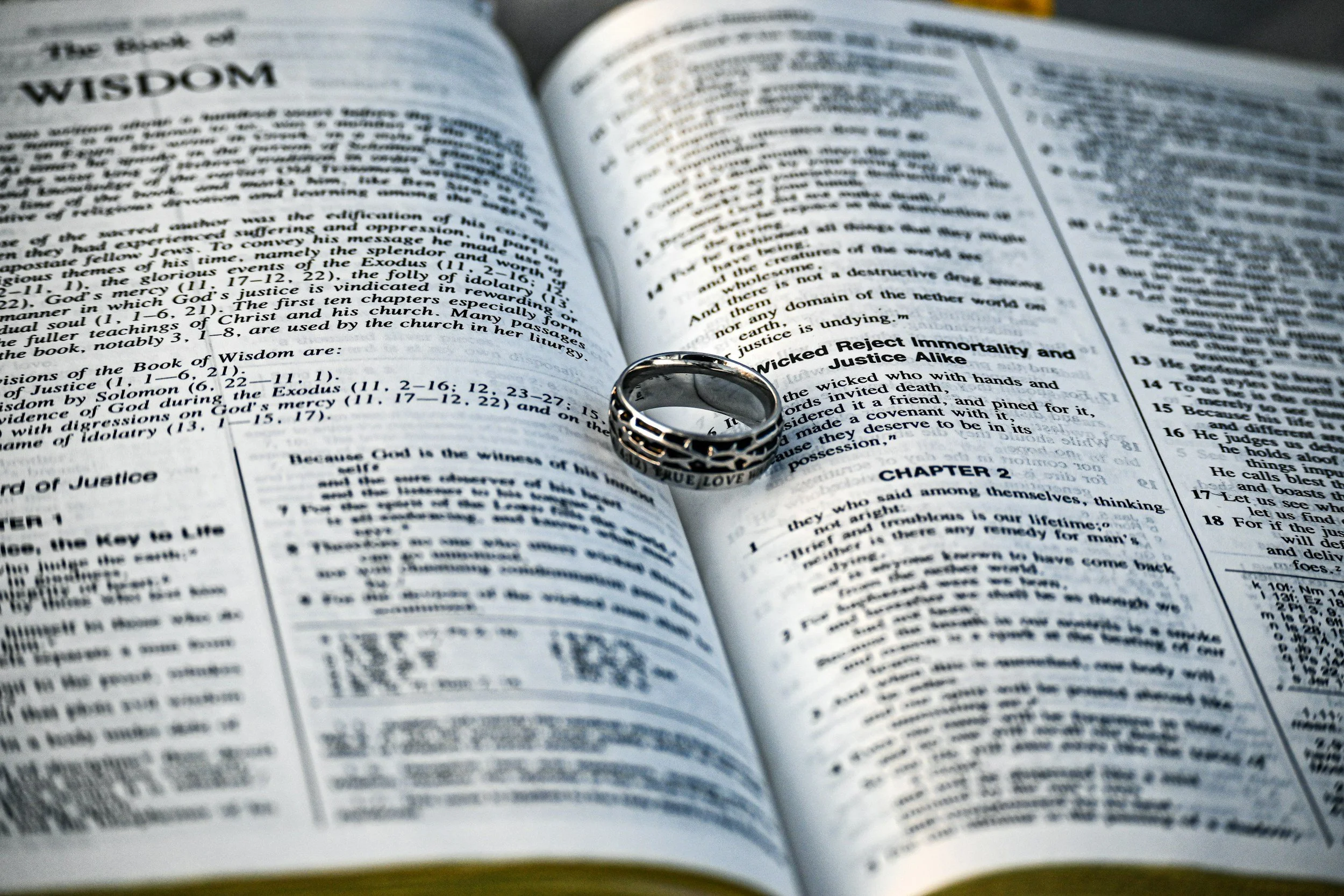 Rings on Bible, christian marriage counseling