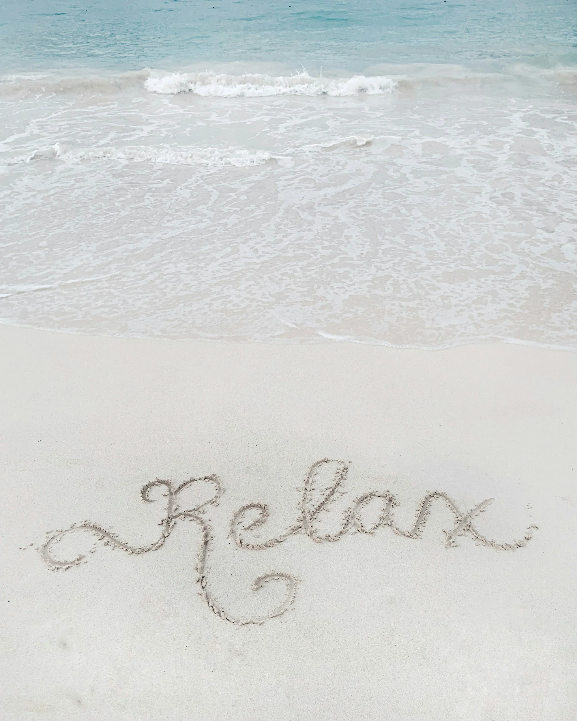 relax word on the beach