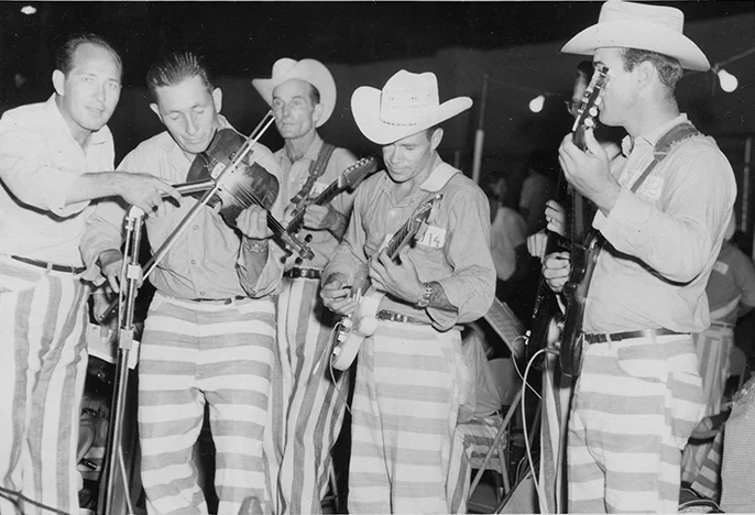 BlueJacket (left) with the "Outlaws" prison band, ca. 1965.