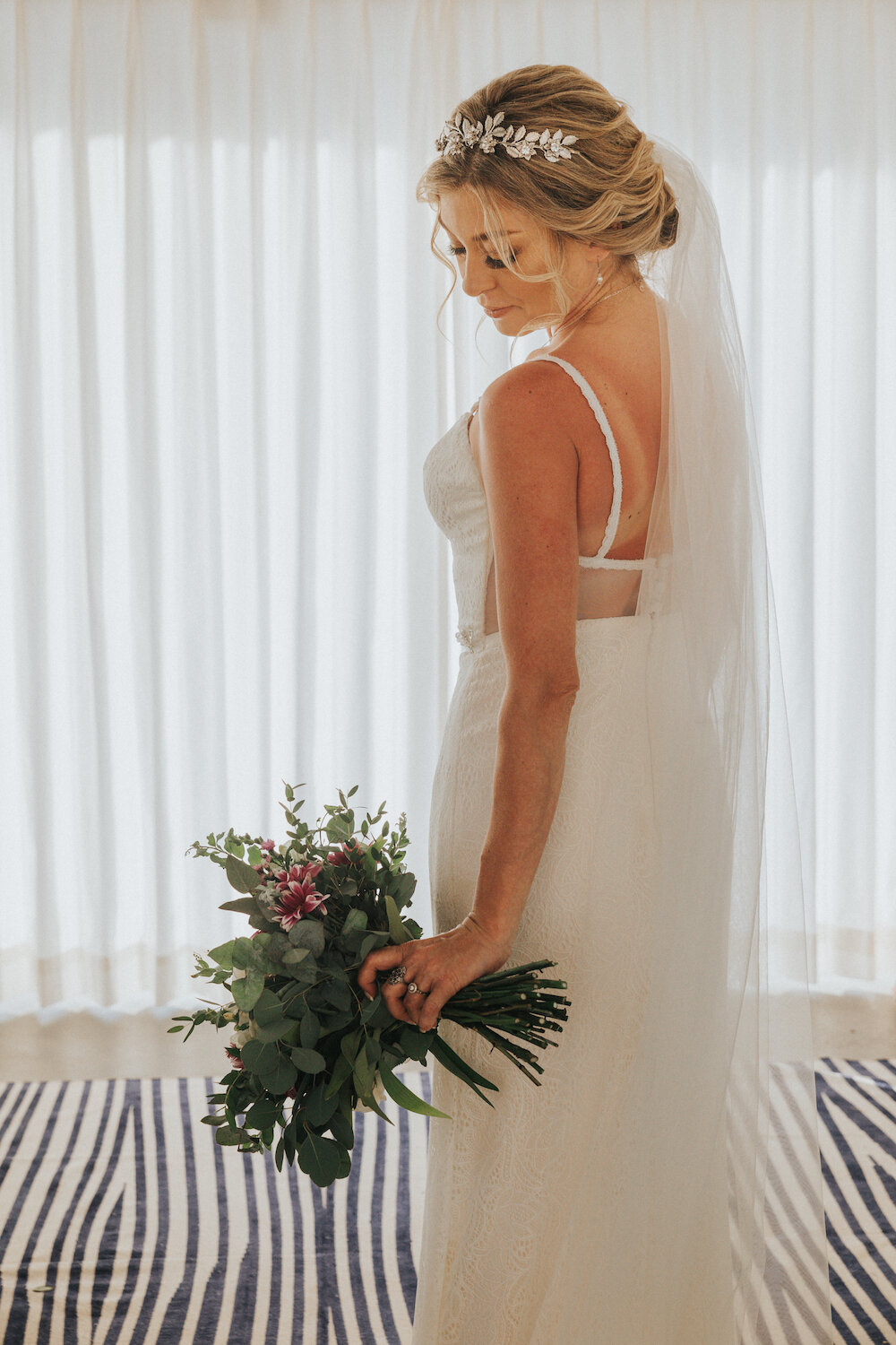 Amanda wore the Ivy gown by Savrina Tavra