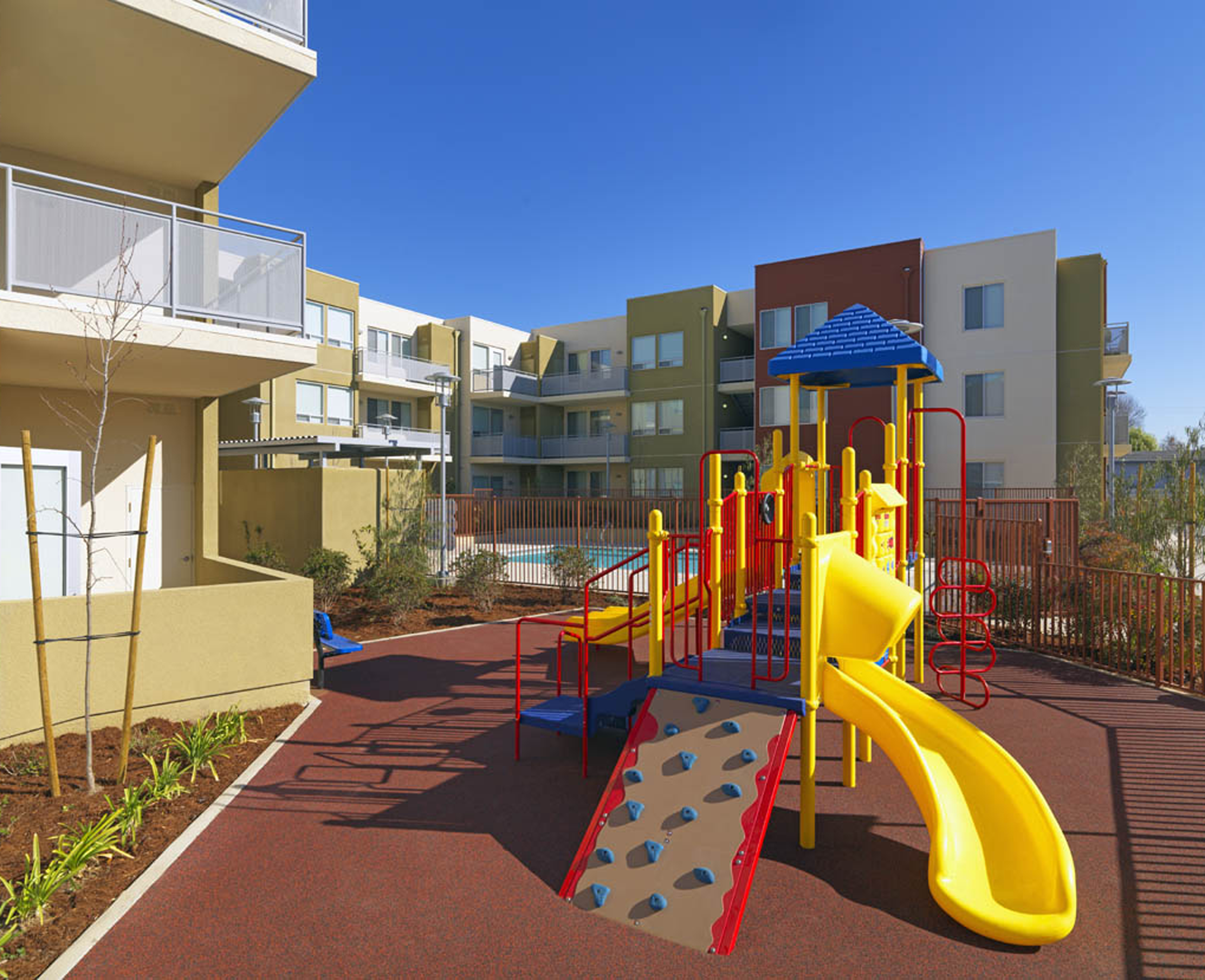 Playground and courtyard within the Vista Del Cielo Family Housing development