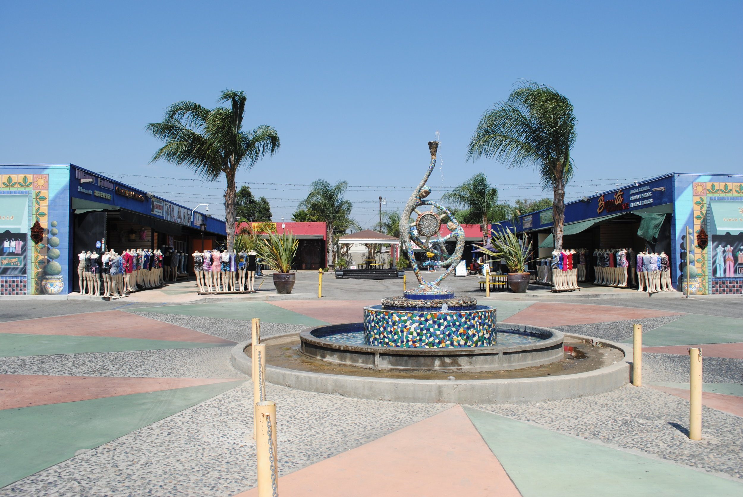 Courtyard view of Plaza Del Valle Shopping Center
