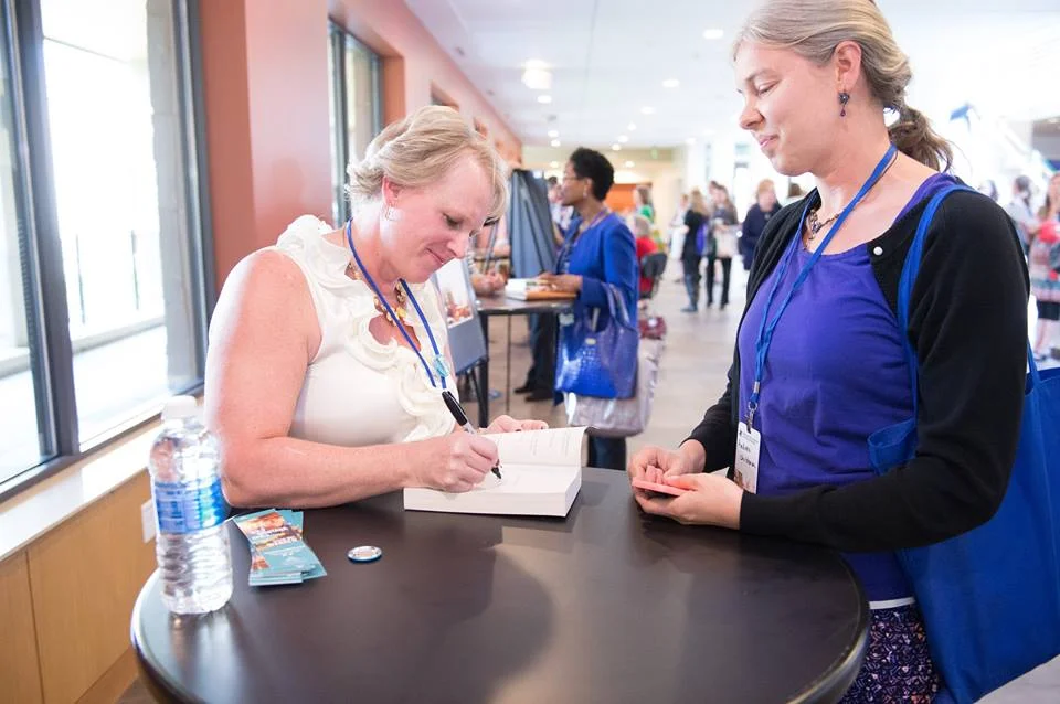 #tbt to the time I met Susan May Warren!! She is signing my copy of " Take a Chance on Me " another great, must read book. I'll loan you my copy, but please don't drop it in the bath!