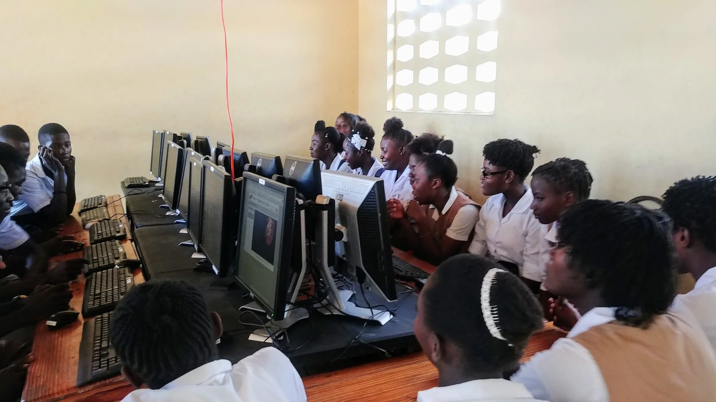 7th - 9th grade students trying the computers out for the first time.