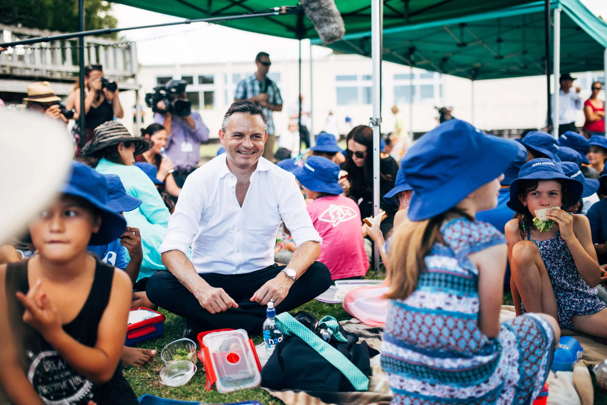 One big kid with all the little kids.