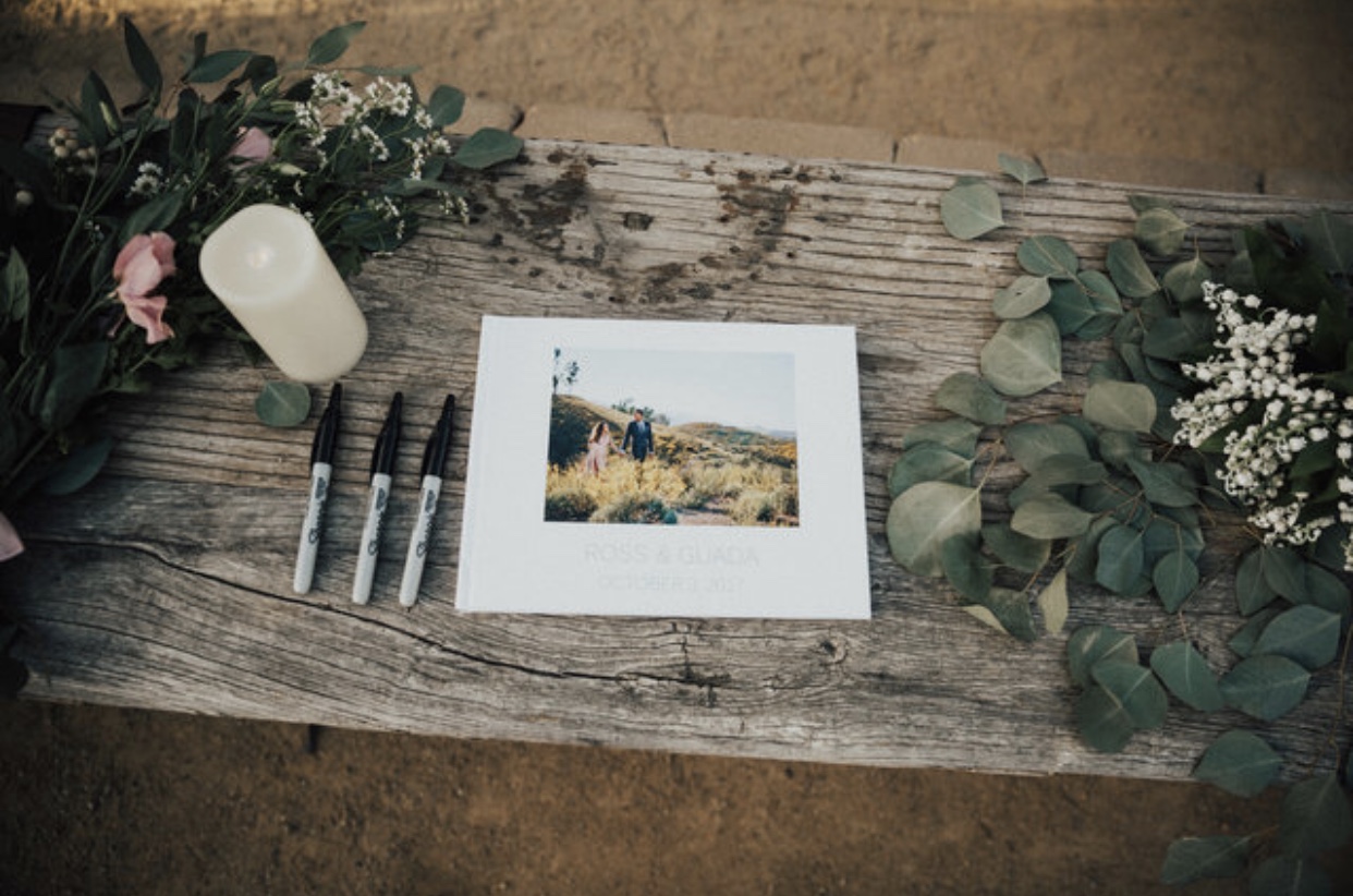 This is an album of our Engagement photos which we also made into a guest book where our guests could leave us a little note. My favorite note is by my 10-year-old nephew, Micah. He wrote, "Good luck with her." LOL.