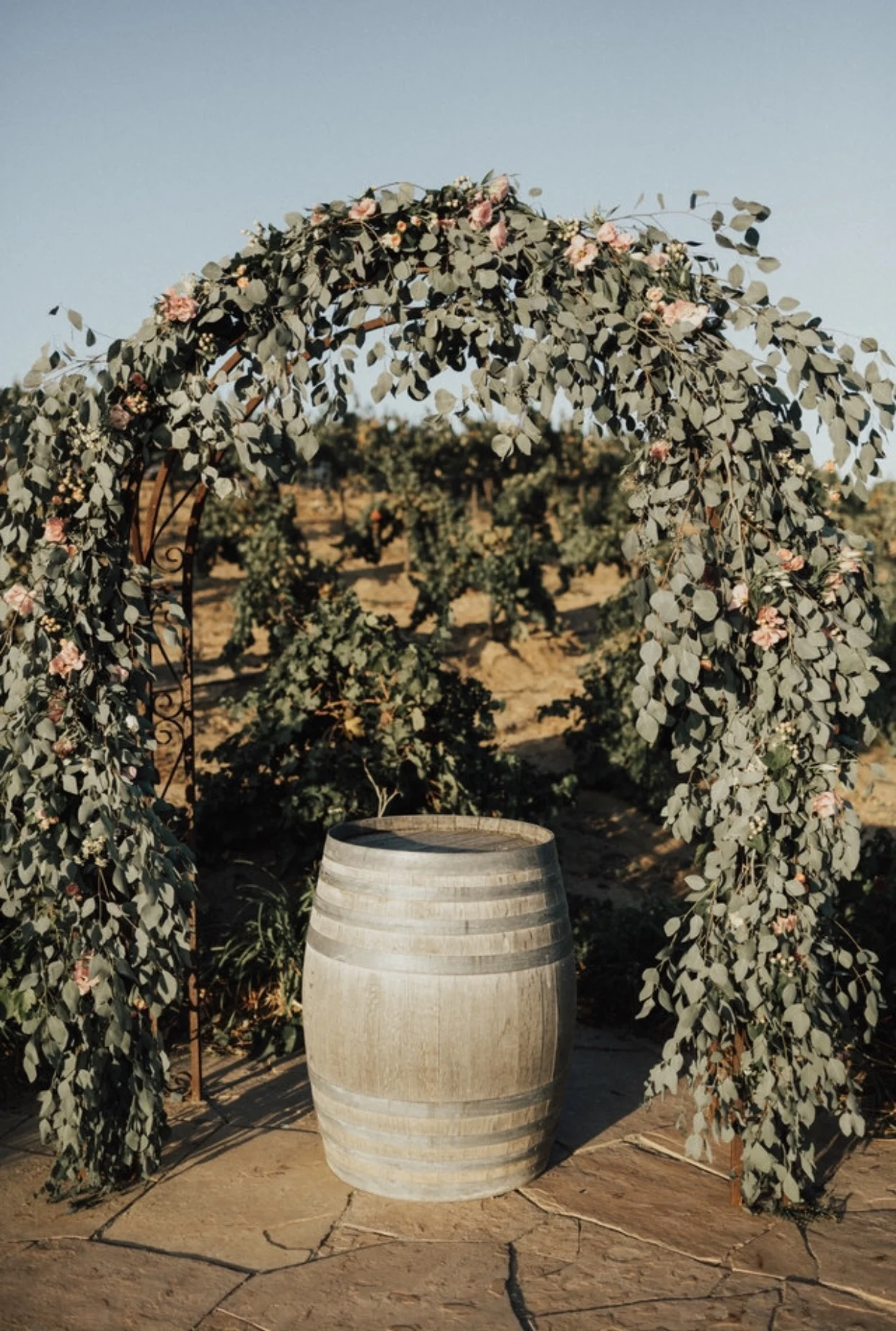 I did not want an arch made of ONLY flowers as that has always looked too over-the-top to me. So, Stephanie filled the arch with Eucalyptus and accented it with flowers here and there. This was perfect and I cried when I first saw how beautiful it looked. 