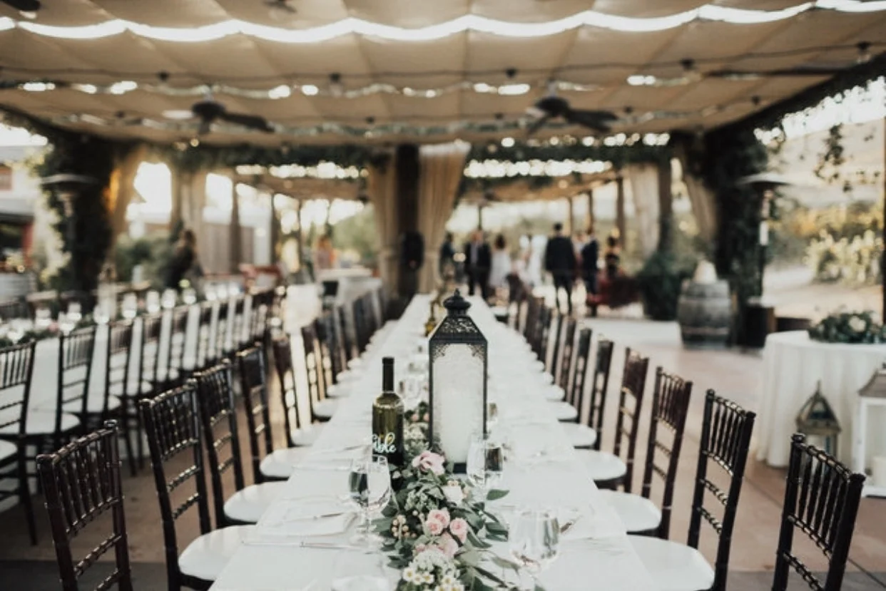 I wanted long banquet tables for my guests, as opposed to the round ones typically found in weddings. Round tables always felt a little too “prom-ish” to me. I kept envisioning long banquet tables because they are often mentioned in the Bible. Seeing this made me think of the Wedding Feast of the Lamb. It gives me good goosebumps. 
