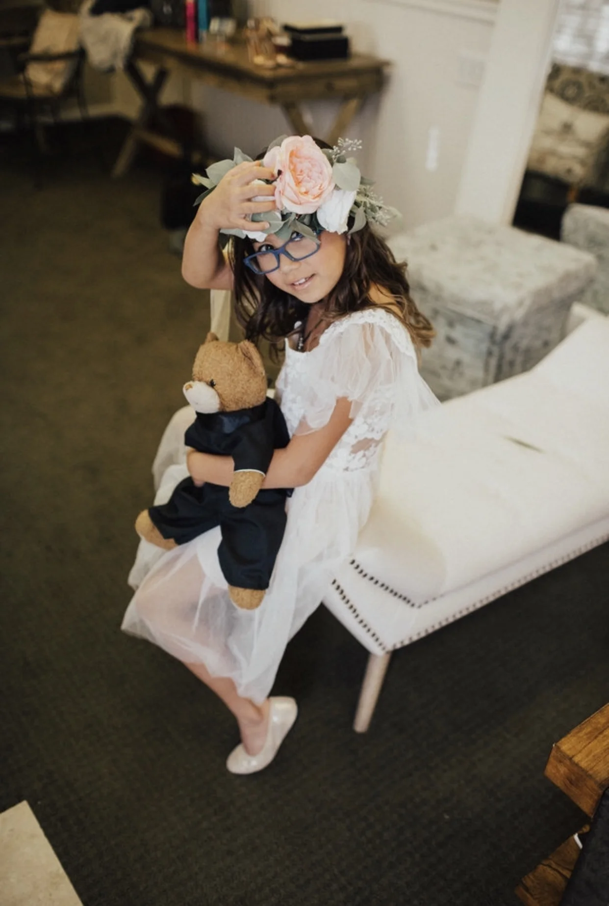 Stephanie wove those flowers in for Sophia's head crown...and Sophia made sure Bear came prepared with his own Suit.