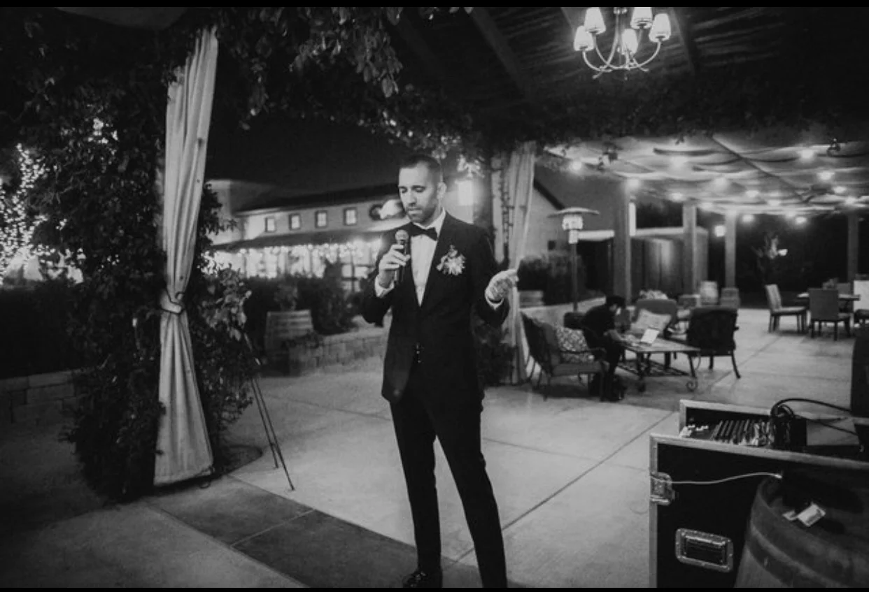 The Groom praying before our wonderful dinner.