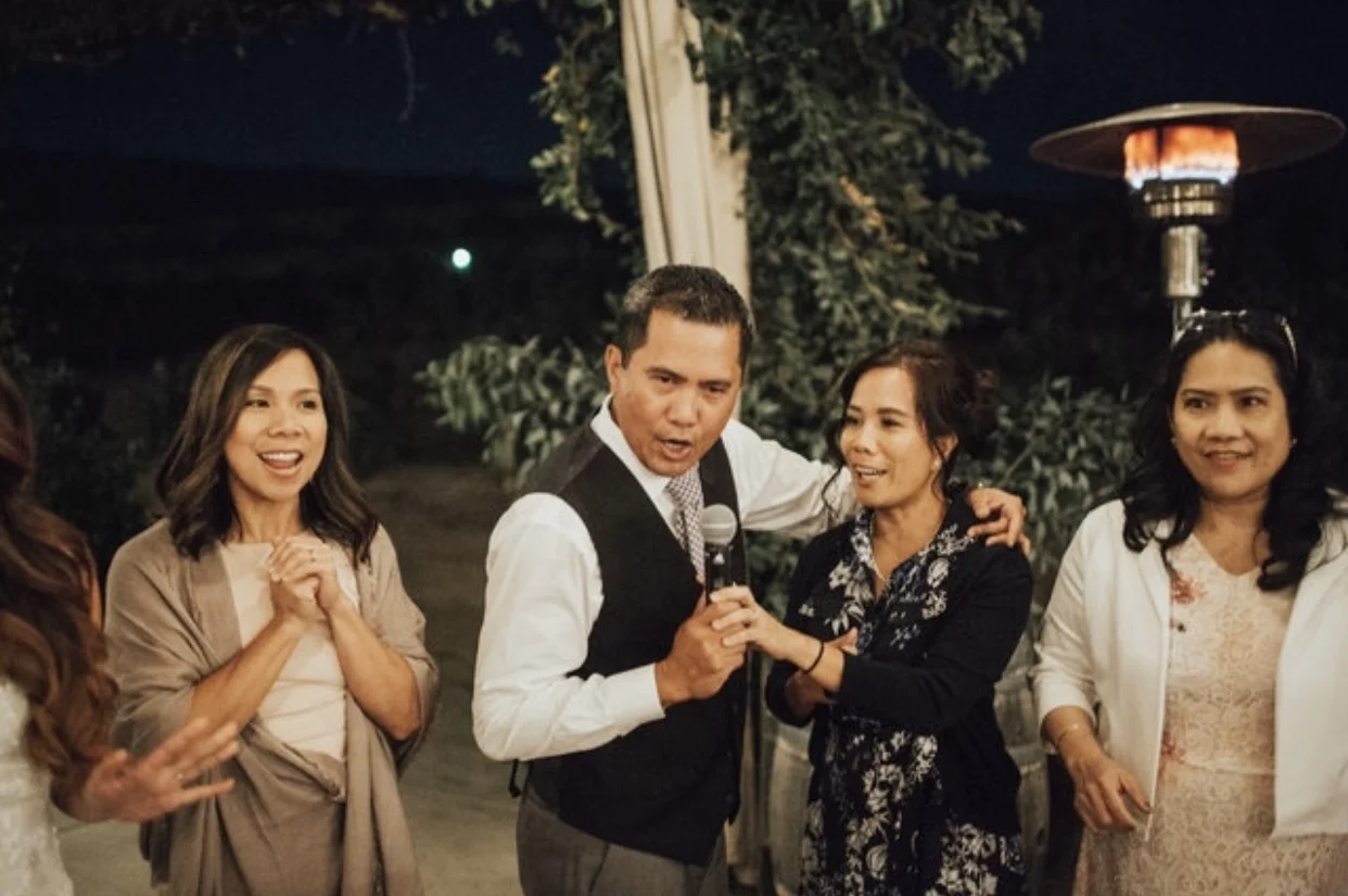 My brother is enthusiastically singing his part of The Heart...he also had too much wine by that time.