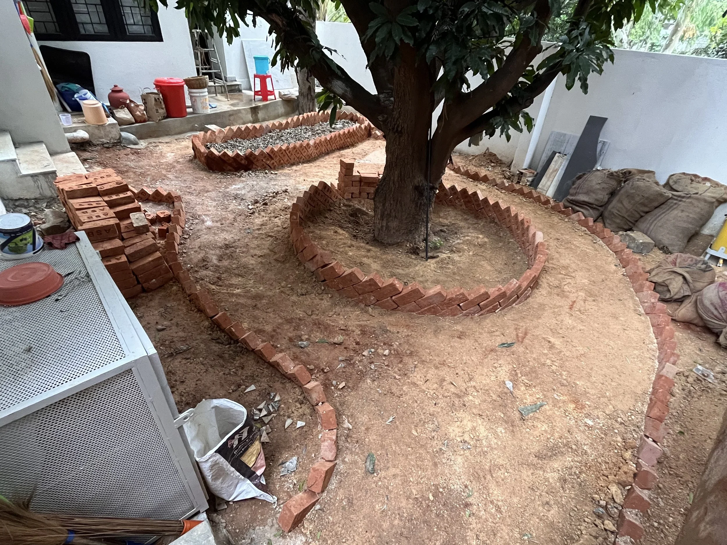 Bricks defining pathways and beds