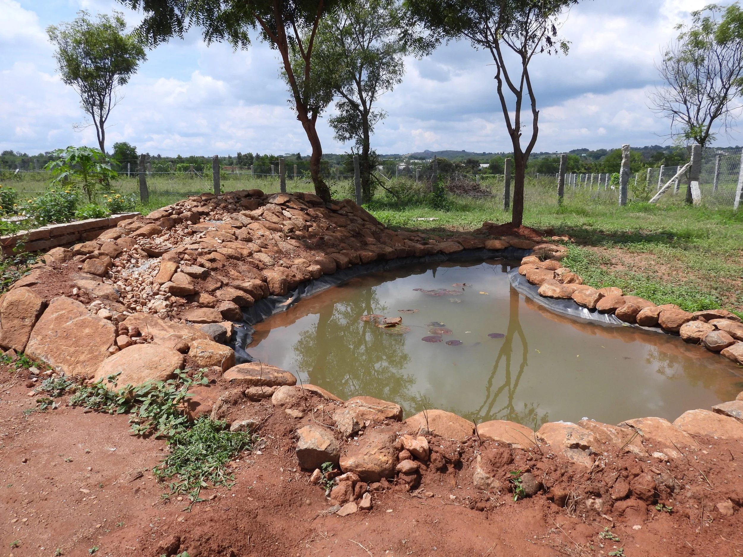 Pond in B with a stream inlet to re-circulate water 