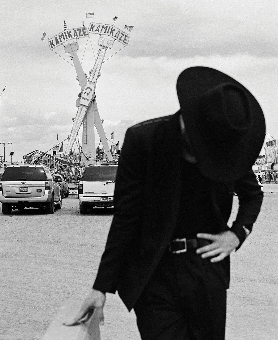  Blurred black-and-white portrait of Josh O’Connor in a cowboy hat at a Colorado carnival, photographed by Sean Thomas for WSJ. Magazine. 