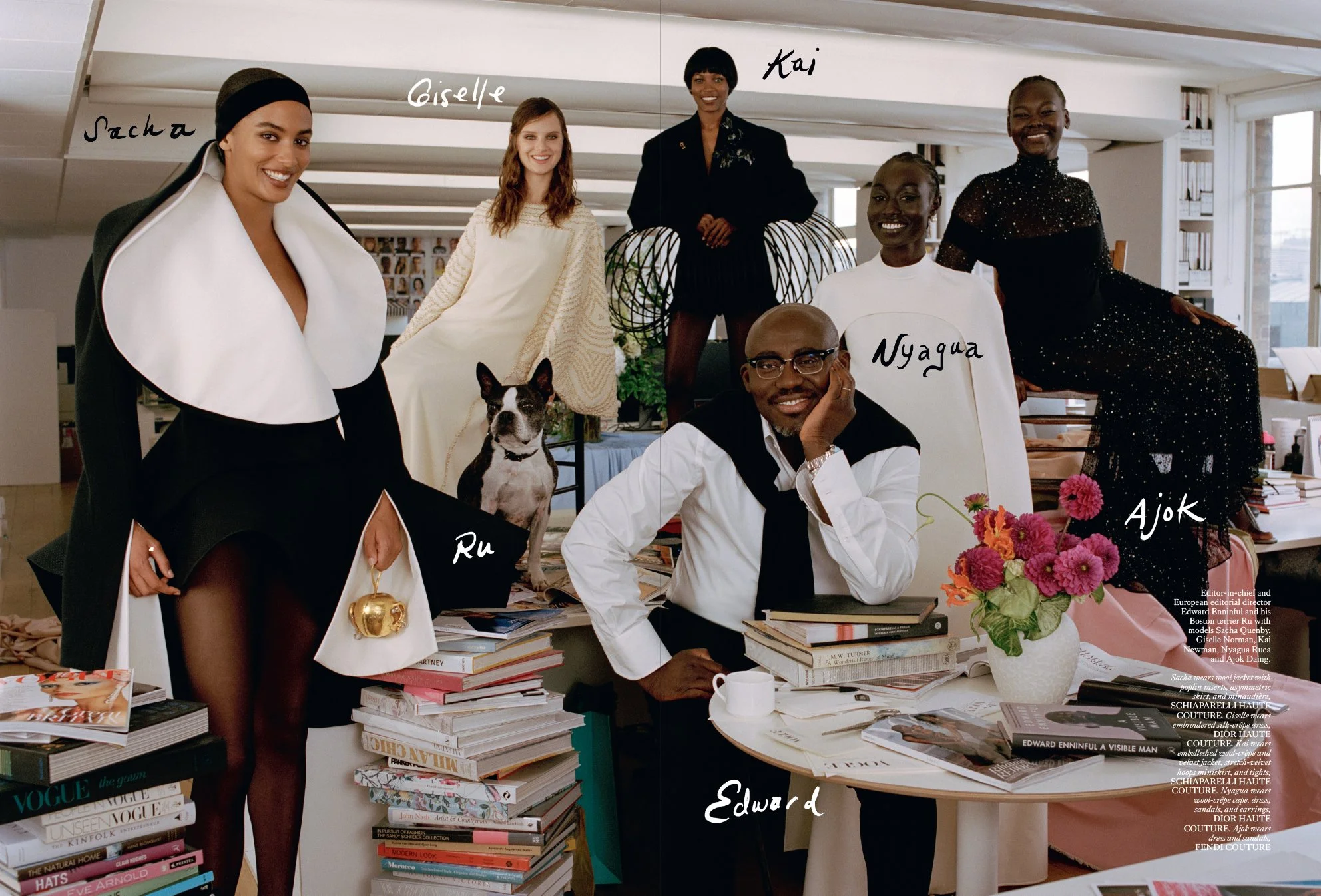  Edward Enninful with his Boston terrier Ru and models Sacha Quenby, Giselle Norman, Kai Newman, Nyagua Ruea and Ajok Daing, photographed by Sean Thomas at Vogue House in London for British Vogue. 