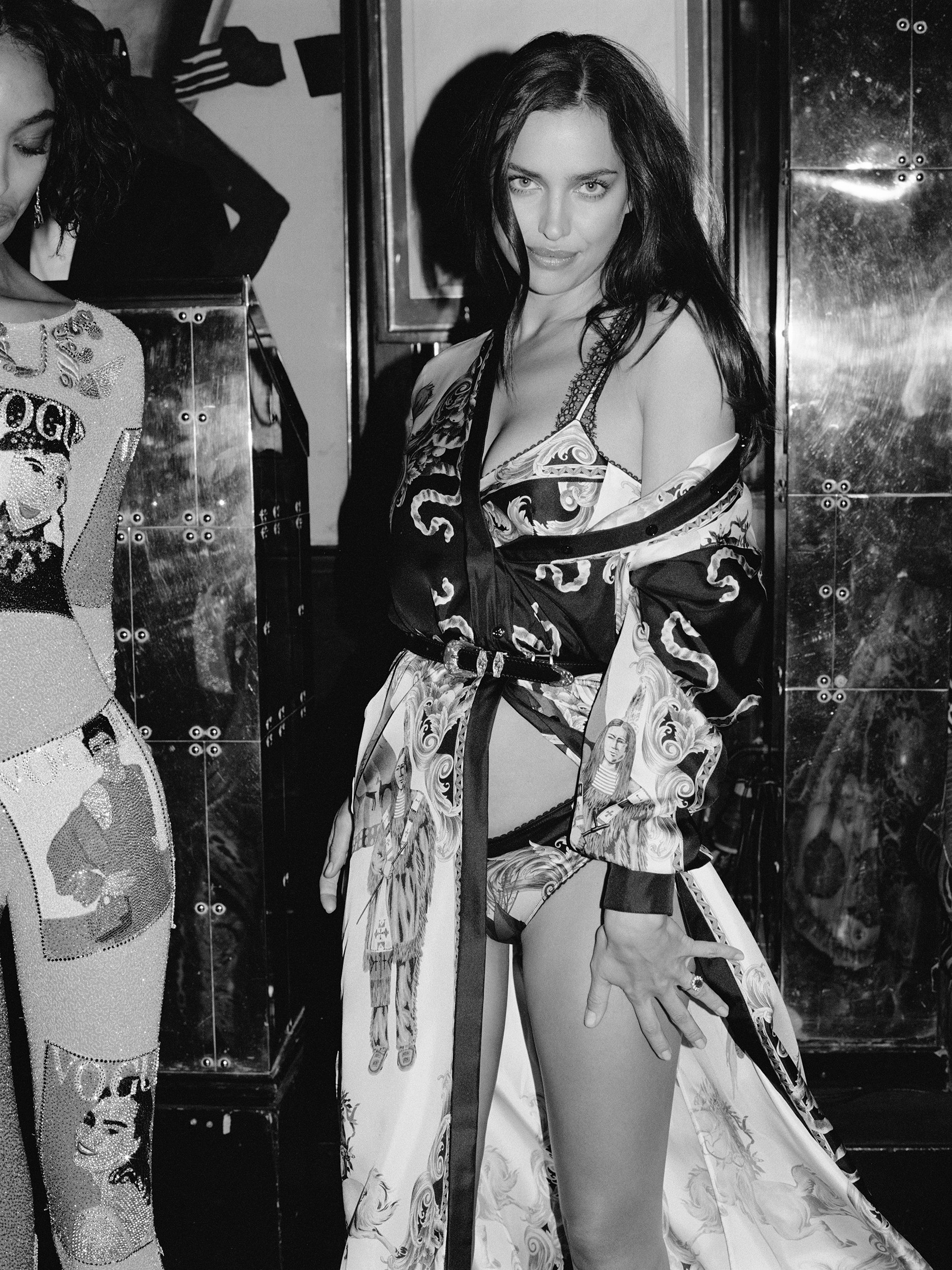  Irina Shayk in Versace at Annabel’s for “Queen of the Night,” British Vogue, April 2018. Photographed by Sean Thomas; styled by Jack Borkett. 
