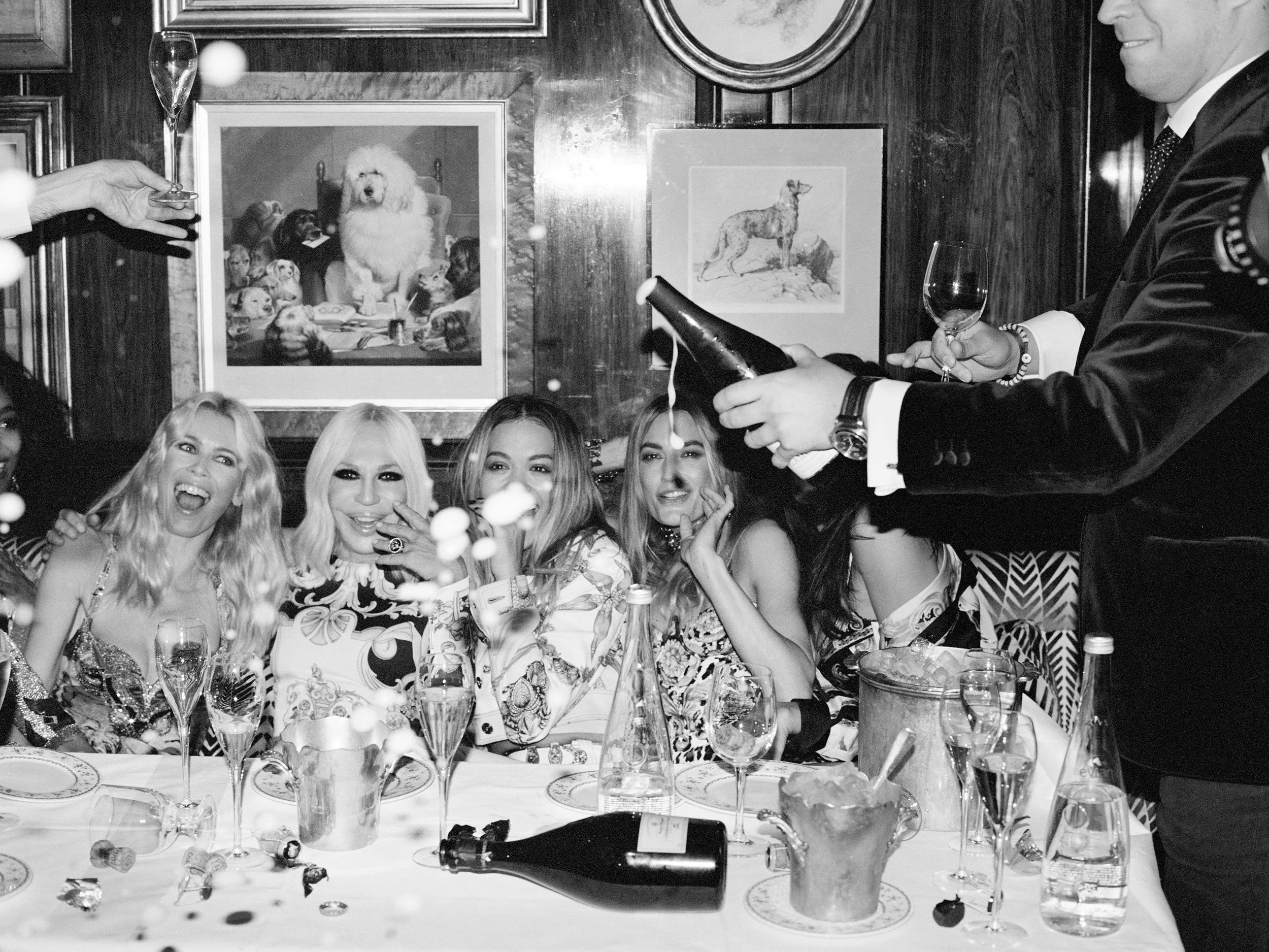  Donatella Versace and friends at Annabel’s, London, for the British Vogue “Queen of the Night” editorial. Photograph by Sean Thomas; fashion styling by Jack Borkett, April 2018. 