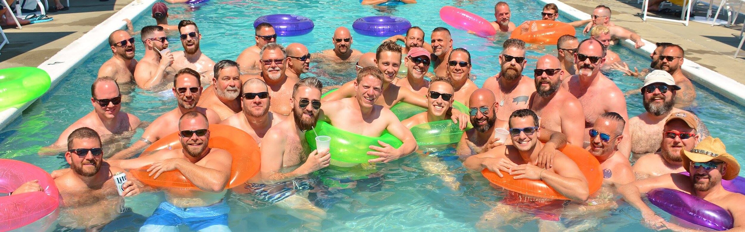 big group of bears in the pool floating.jpg