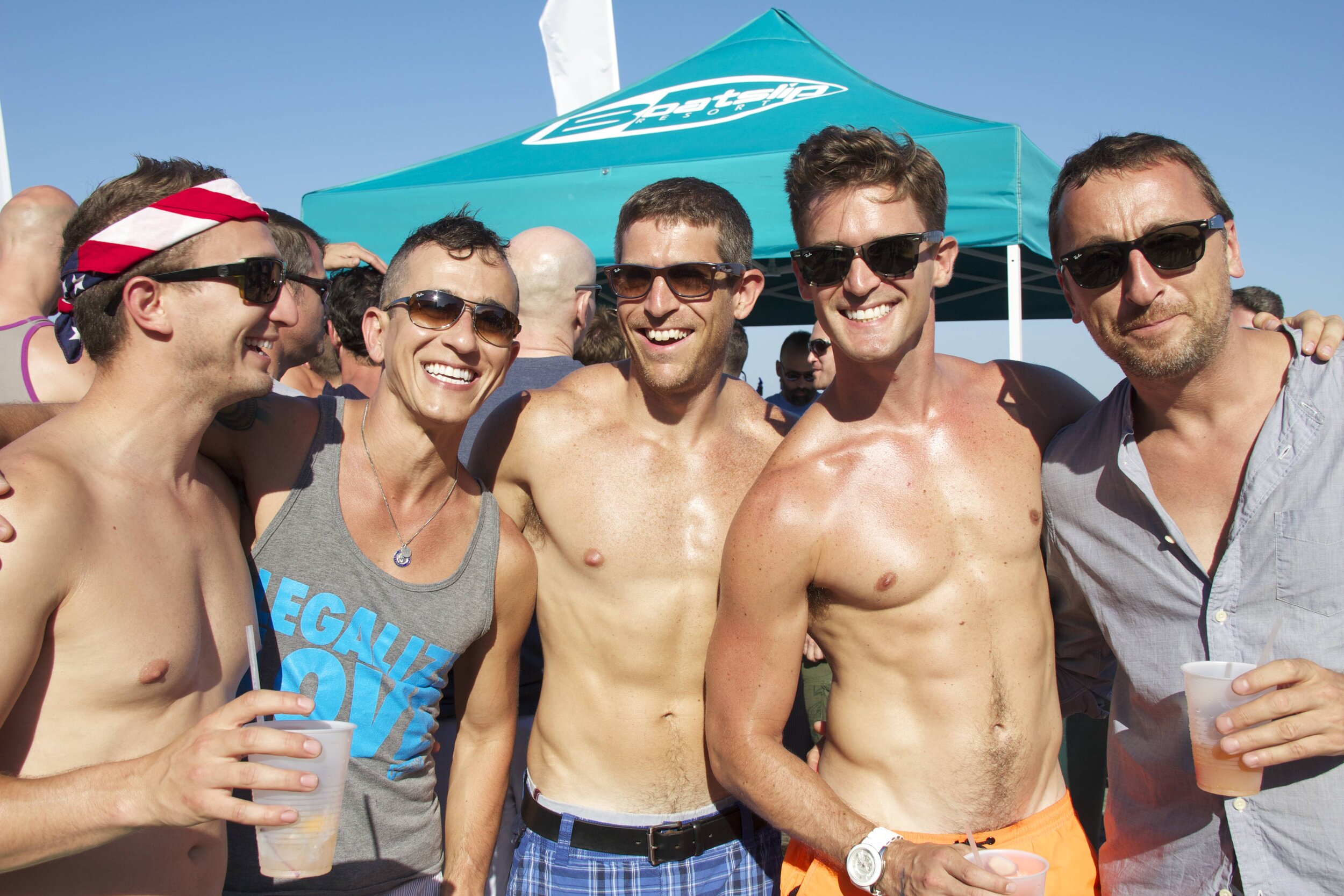 4 smiling guys-boatslip tent.jpg