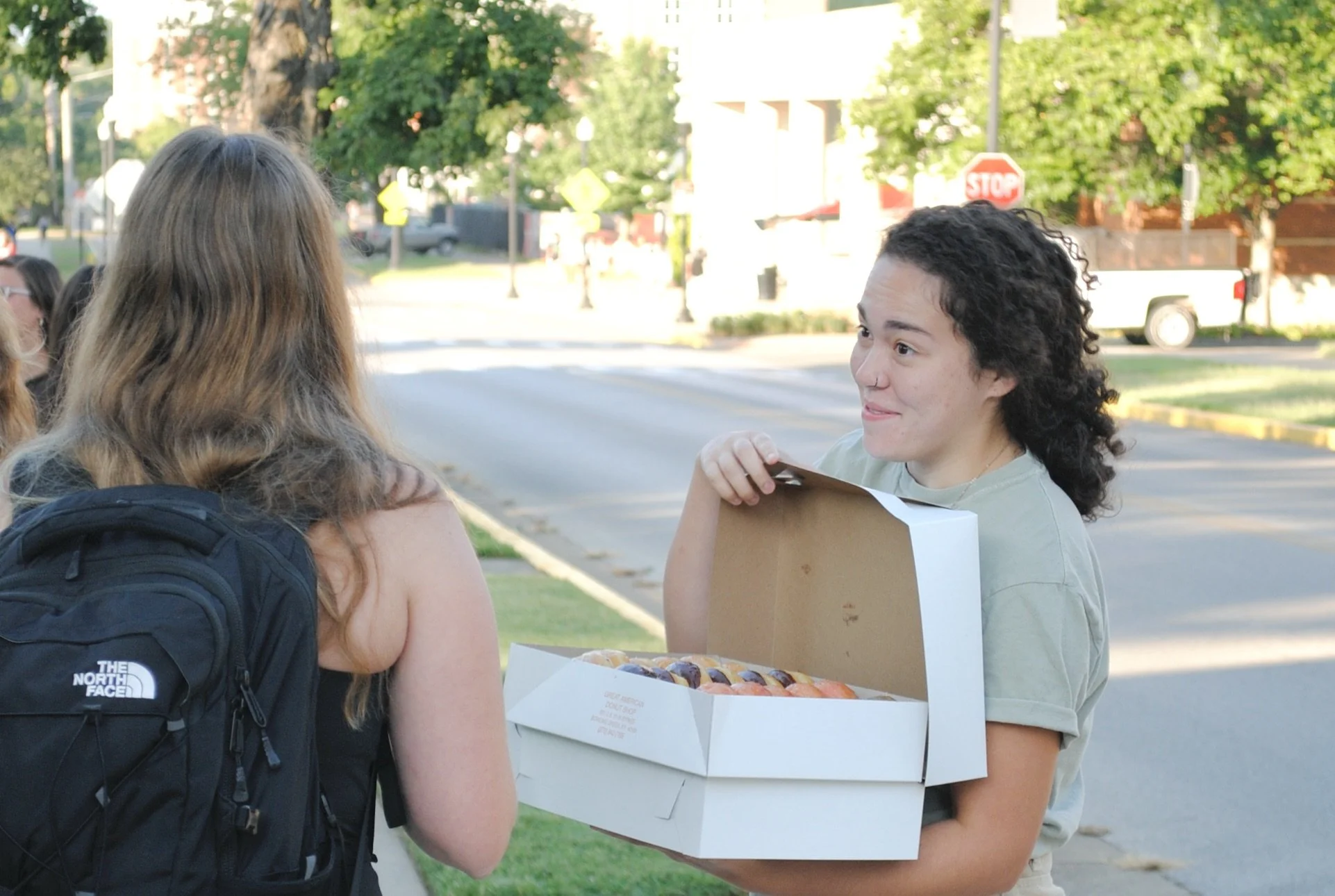 Handing out Coffee And Donuts on Campus