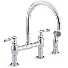 kitchen sink faucet Kohler Two-hole deck-mount bridge kitchen sink faucet This Parq kitchen faucet delivers a fresh interpretation of the traditional bridge design, incorporating clean lines for ease of maintenance. The high-arch gooseneck swing spout provides generous clearance over pots and pans, while the separate sidespray pulls down into the sink for easier cleaning and up-close tasks.