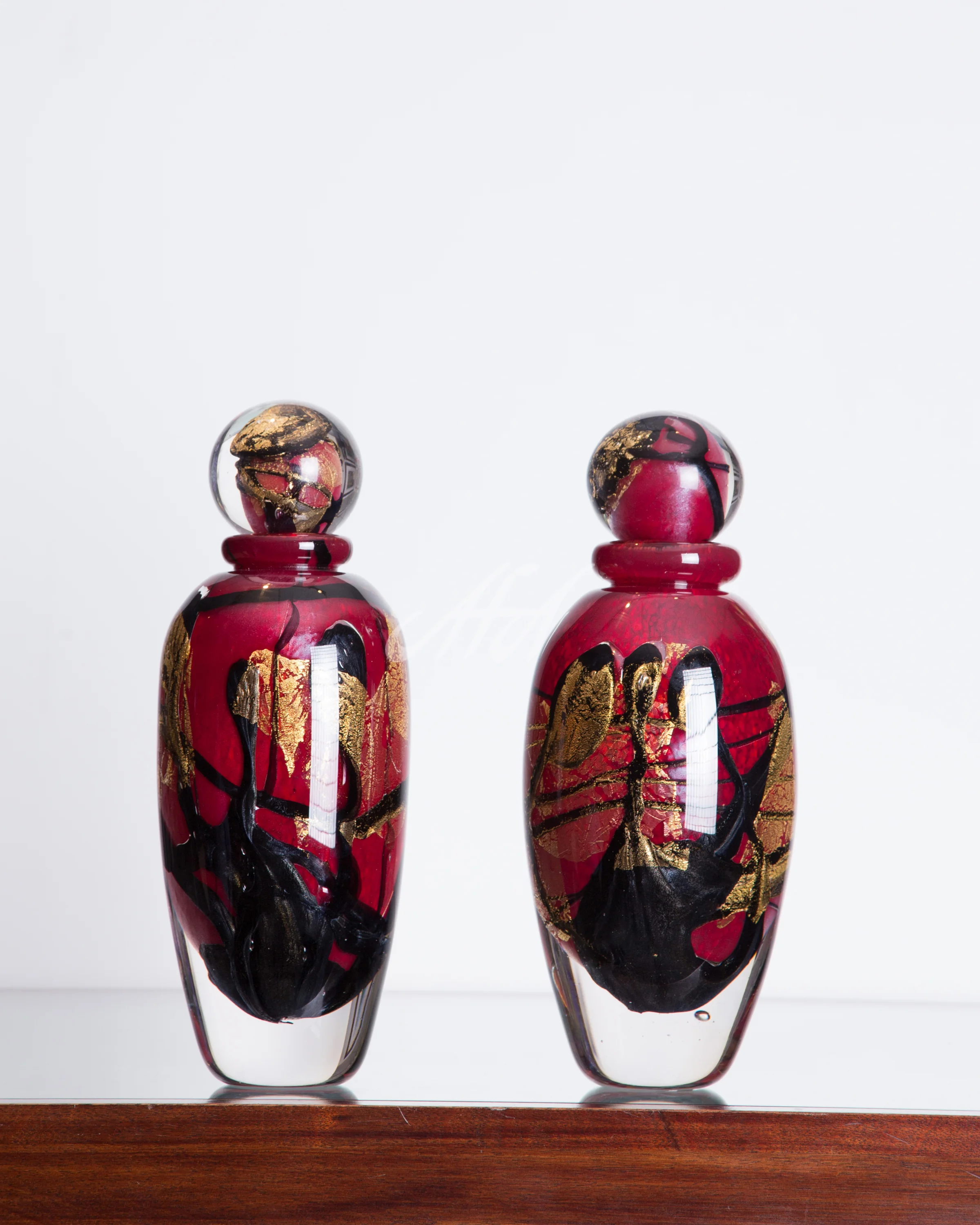 CRO_ Red black gold landscape bottles watermark lores.jpg