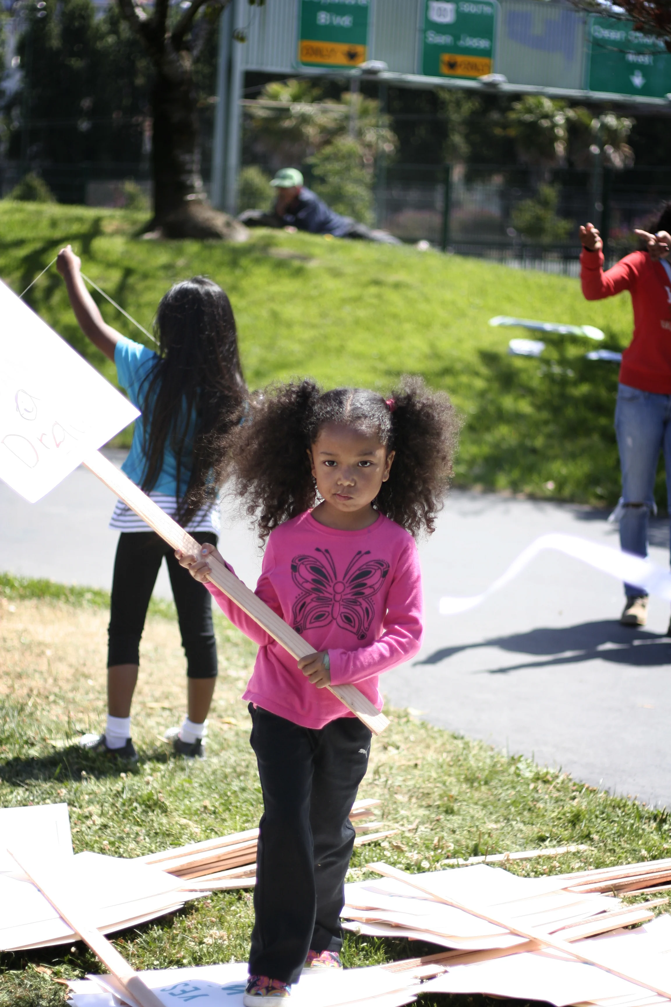 MAP Young Girl with sign.jpg