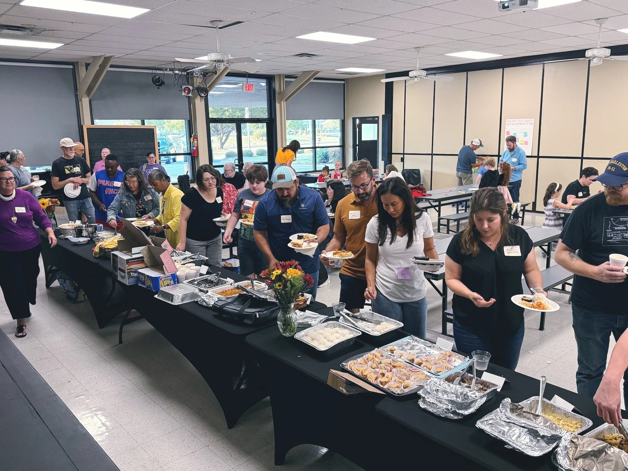 🌍🖤💛 Last night&rsquo;s Togetherness Dinner was a beautiful celebration of community and connection! Families came together to share a wide variety of delicious dishes from around the globe, filling Tucker Assembly Hall with warmth, laughter, and a