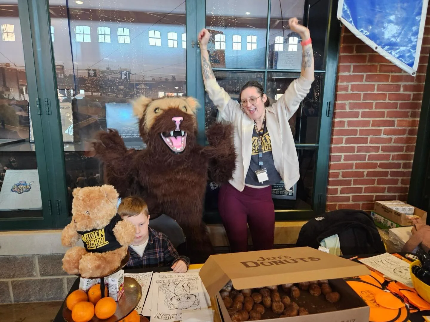 Wally the Wolverine and friends are representing Walden at the #GravyCup! Come by and say hello 🖤💛 Go Wolverines! #waldenschool