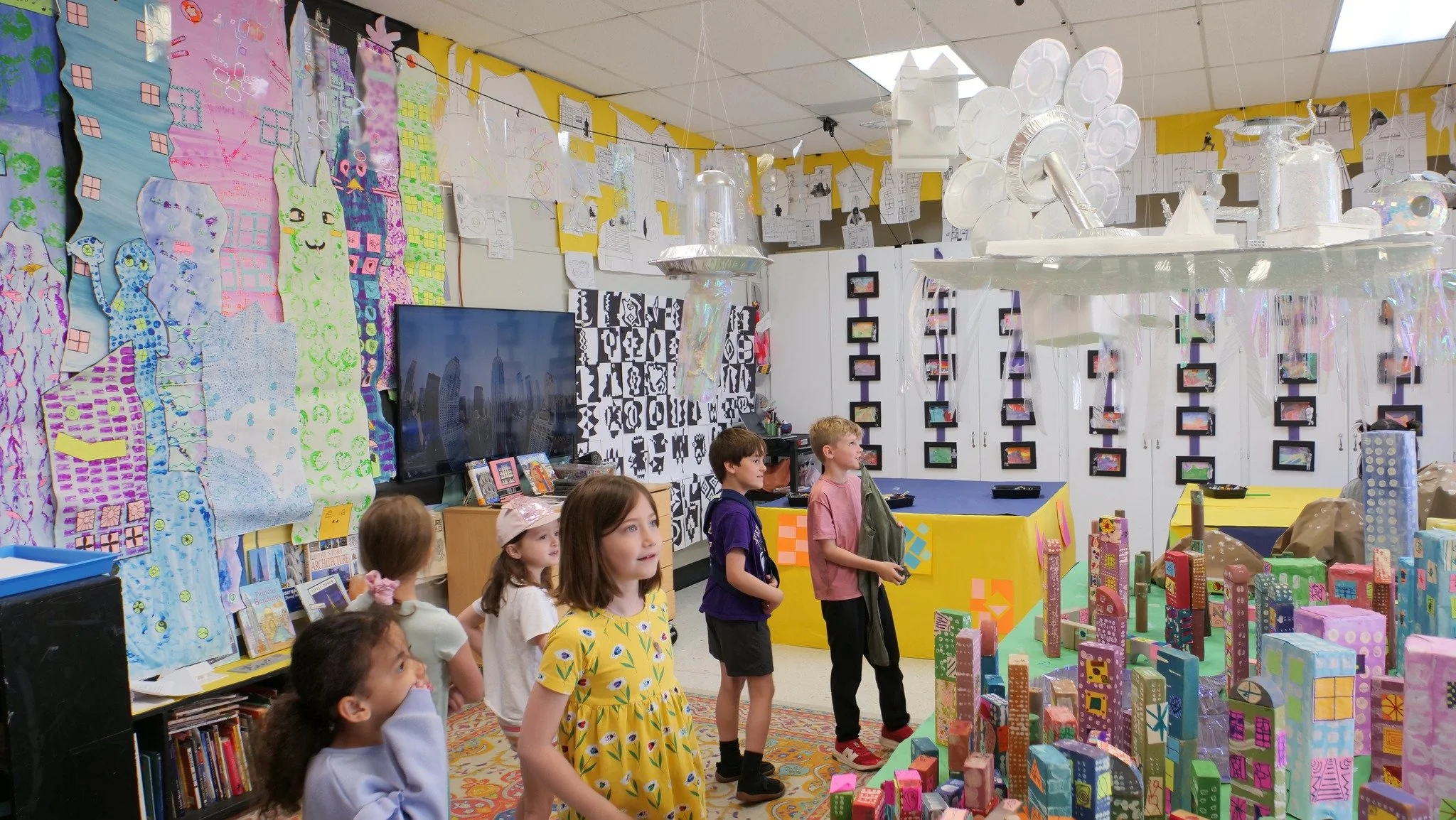 Our K&ndash;8th Grade Art Installation brought architecture to life beyond the art room, expanding into the hallway for all to experience! 🏙️

Students explored architectural design through painting, printmaking, photography, and sculpture&mdash;fro