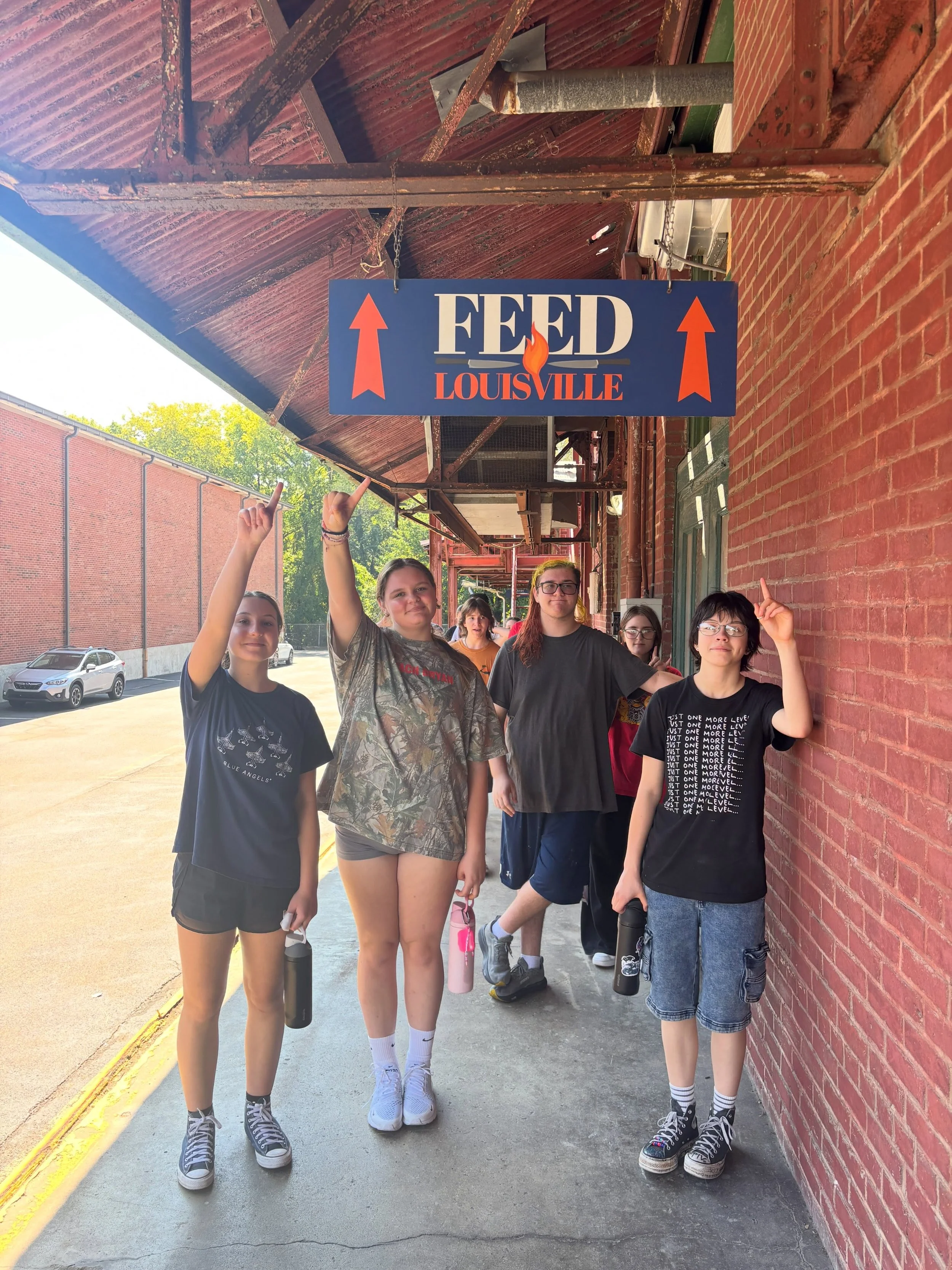 Yesterday the high school divided forces for one of our twice yearly service days. Students lent their time (and considerable enthusiasm) to Feed Louisville, Trees Louisville, Brightside, and Catholic Charities.