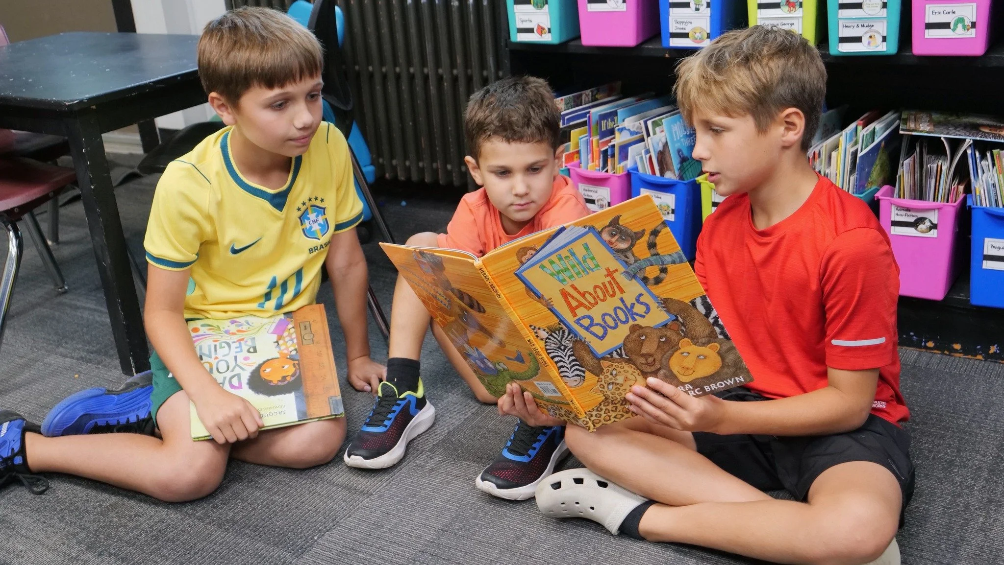 Our 4th graders spent some time reading with their Kindergarten buddies&mdash;and this is such a perfect example of what makes Walden, Walden. Older students leading, younger students learning, and a whole lot of connection in between.

This is commu