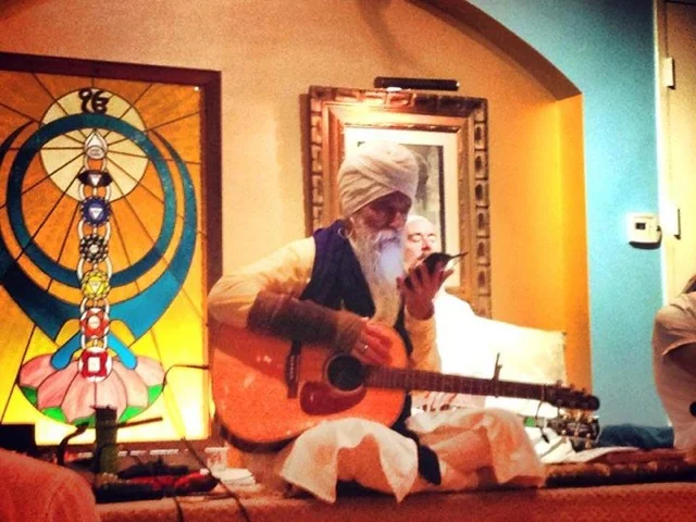 Guru-Singh-with-baby-news.jpeg