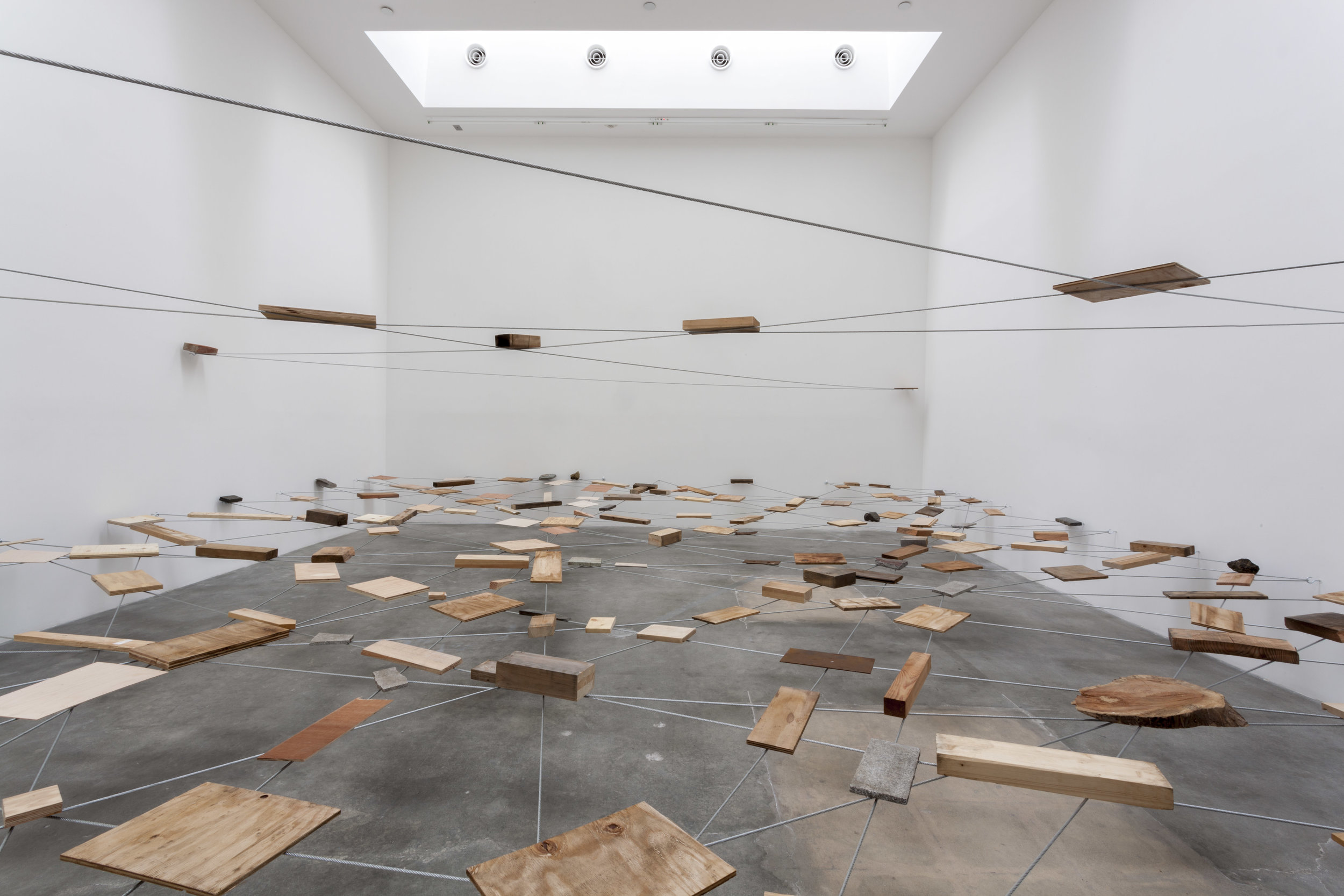 Left-Behind Situation , 1972/2012 捨置状況 ( Shachi Jōkyō ) Wood, stone, wire rope Dimensions variable Installation view, Blum & Poe, Los Angeles, 2012 Courtesy Blum & Poe, Los Angeles / New York / Tokyo