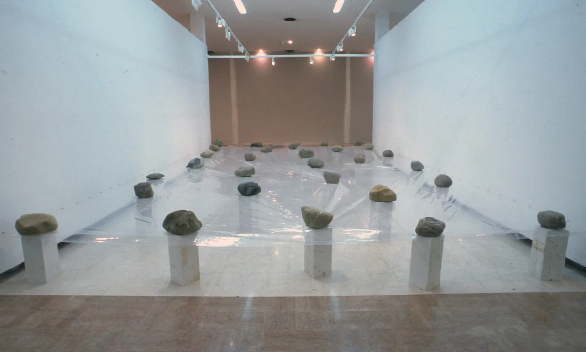 Law of Multitude , 1975/1992 多分律 ( Tabunritsu ) Plastic sheet, stone, concrete Dimensions variable Installation view, Avanguardie giapponesi degli anni 70 , Galleria Comunale d’Arte Moderna di Bologna, 1992 Photo: Tsuyoshi Satoh