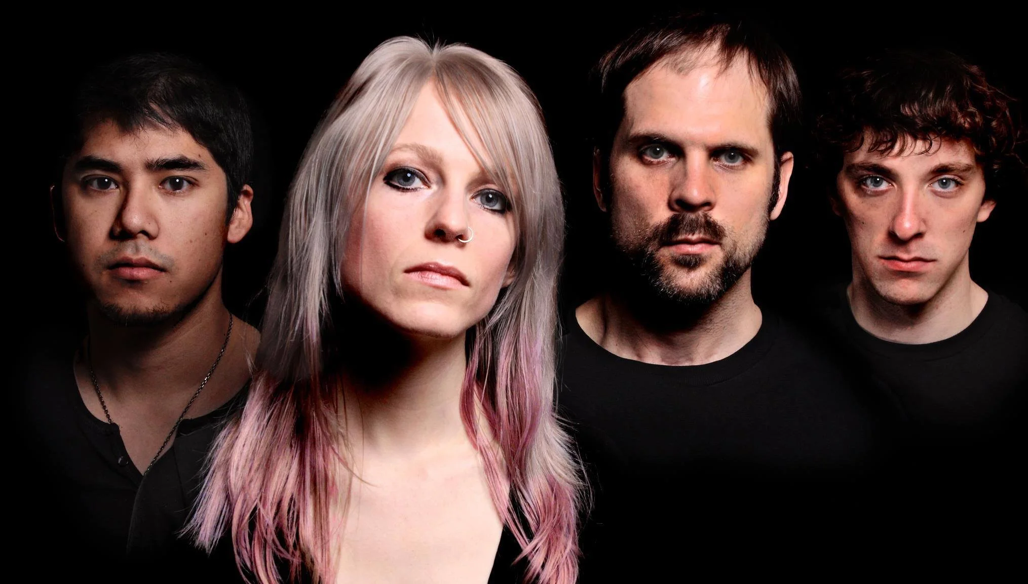 Erica, second from left to right, with her "SEVEN SUNS" musical band.