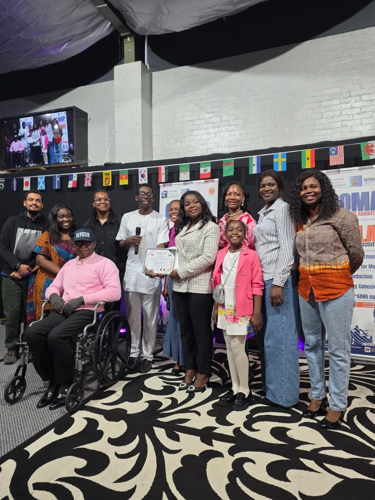 Deborah and her team with AJ Falana