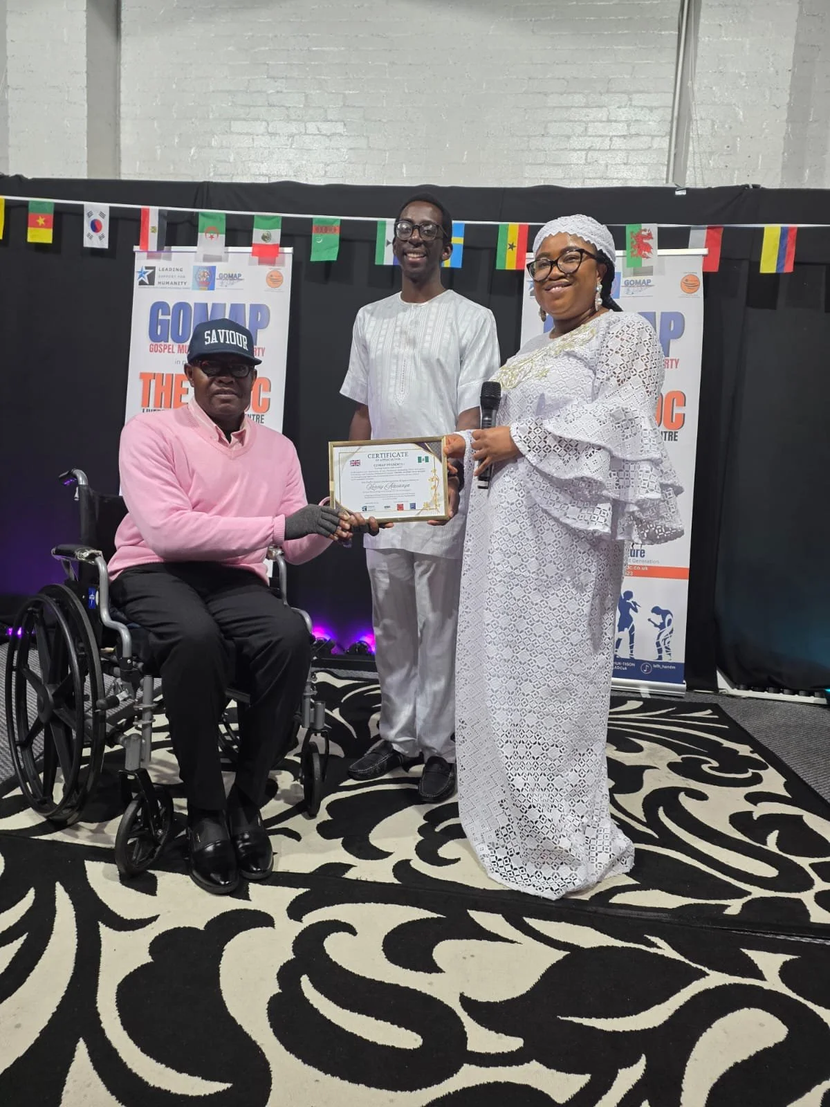 Kenny Adesanya with AJ Falana and MC