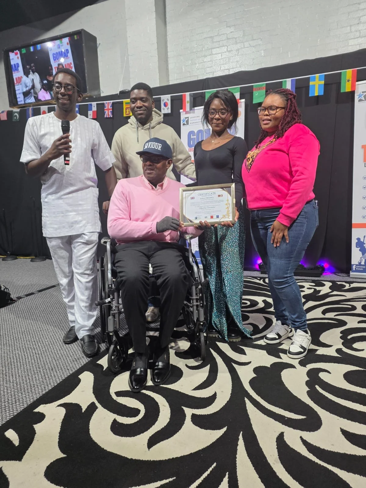 Rumbey Christabel and her team with AJ Falana and MC