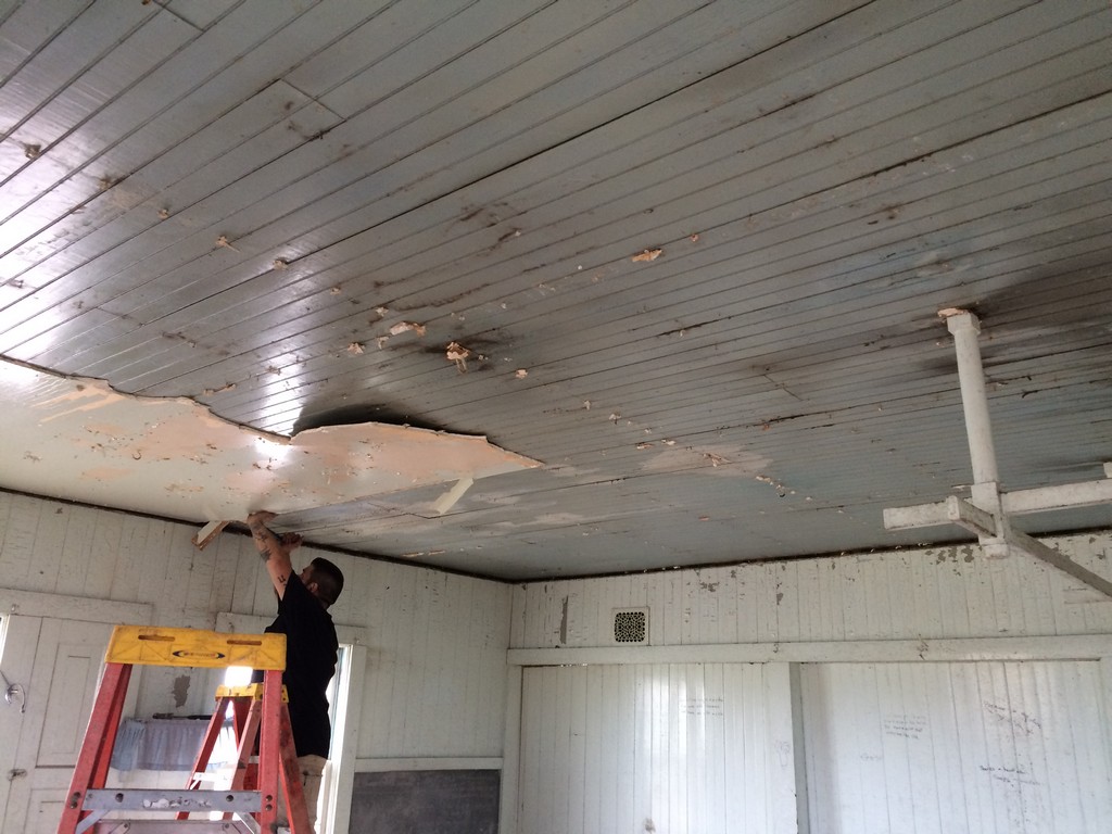 Original ceiling is exposed as drywall in removed.
