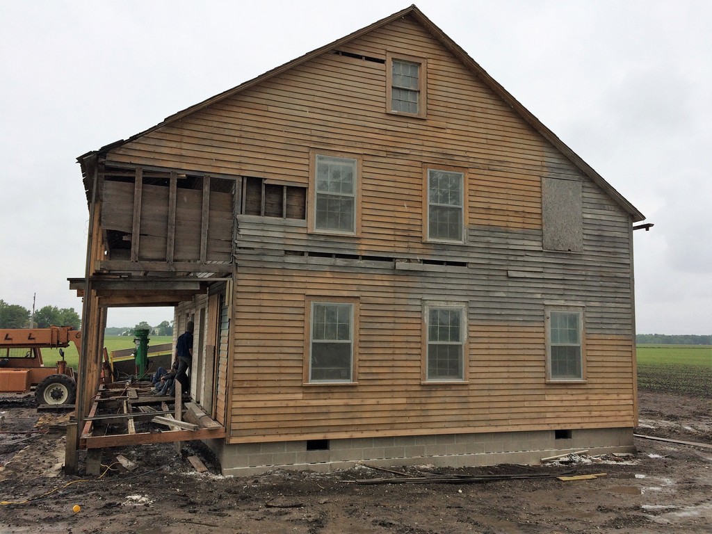South side of the house after scraping and power washing.