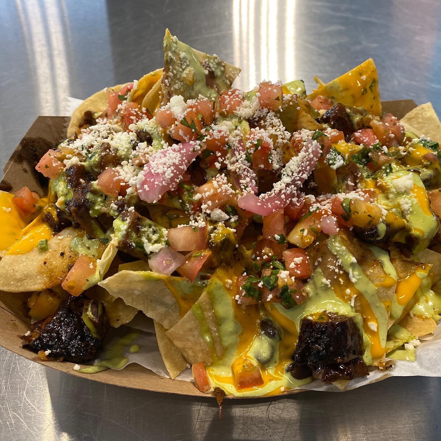 This post isn&rsquo;t about beer, but you all need to know about @mayarosa_orlando.  @beer_mike_beer ordered these Burnt Ends Nachos and LOOK HOW AMAZING IT LOOKS!  Best food truck in Orlando.
