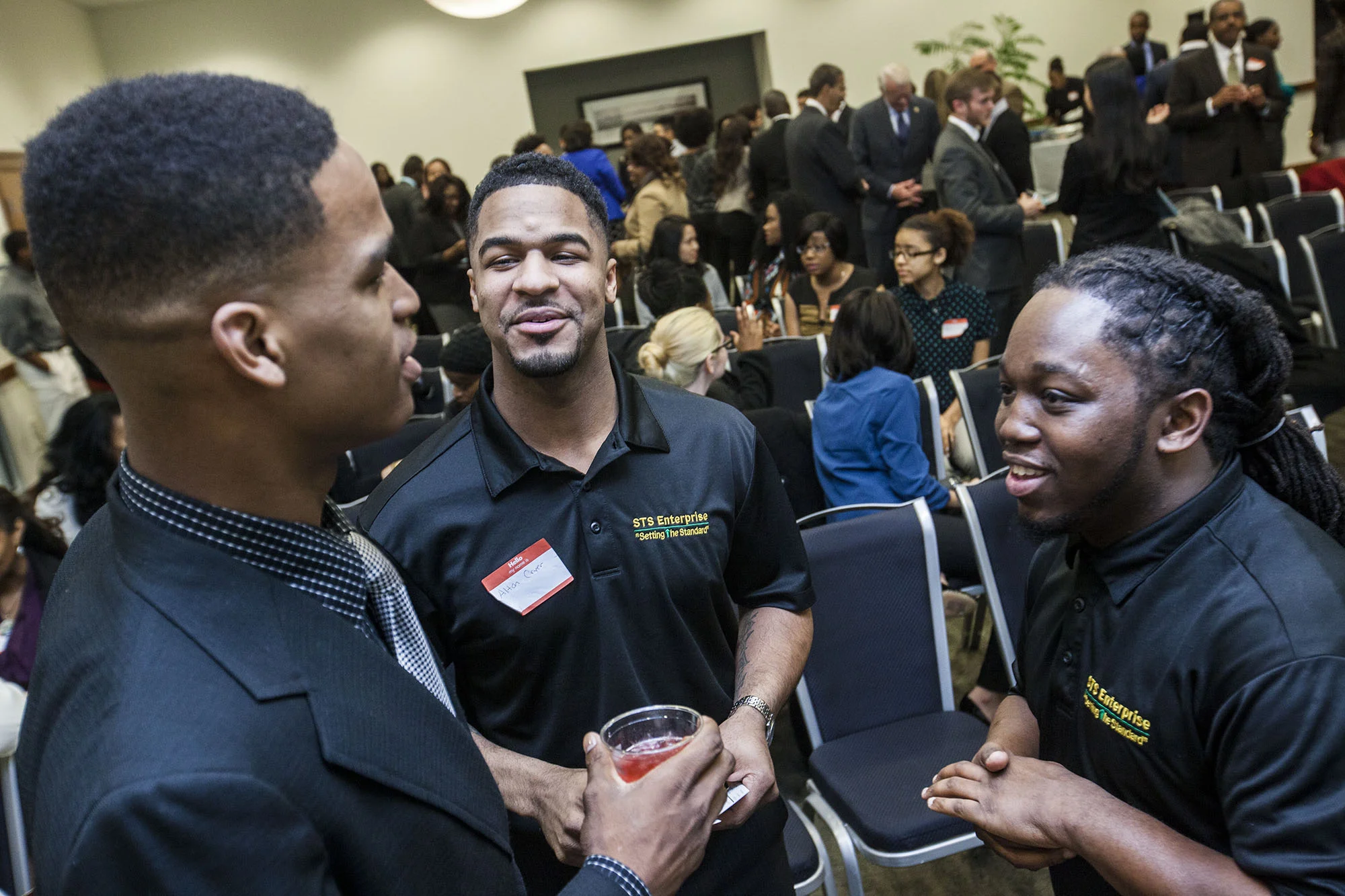  The crowd mingles while at the "Bringing out the Leaders" event at the University of Memphis on Thursday night. The event is part of Alton Cryer (far left) and Jeremy Calhoun's (not pictured) efforts to help college students network with local government and business officials. (Andrea Morales/Special to the Commercial Appeal)